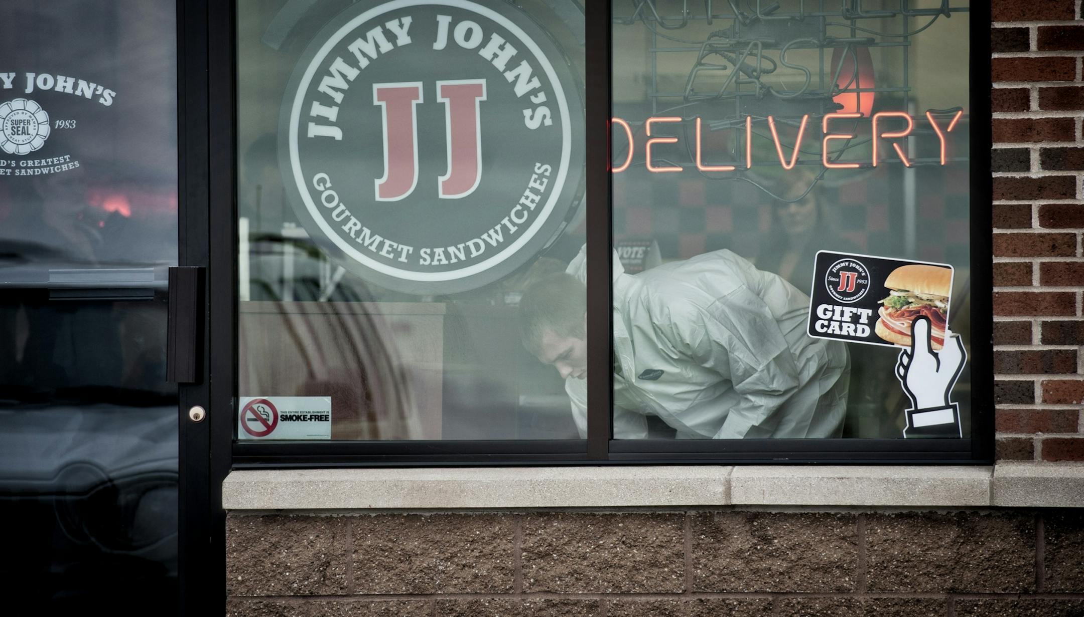 Workers cleaned up the Cottage Grove Jimmy John's Thursday morning, October 25, 2012 which was the scene of Wednesday's murder suicide. Thursday, October 25, 2012