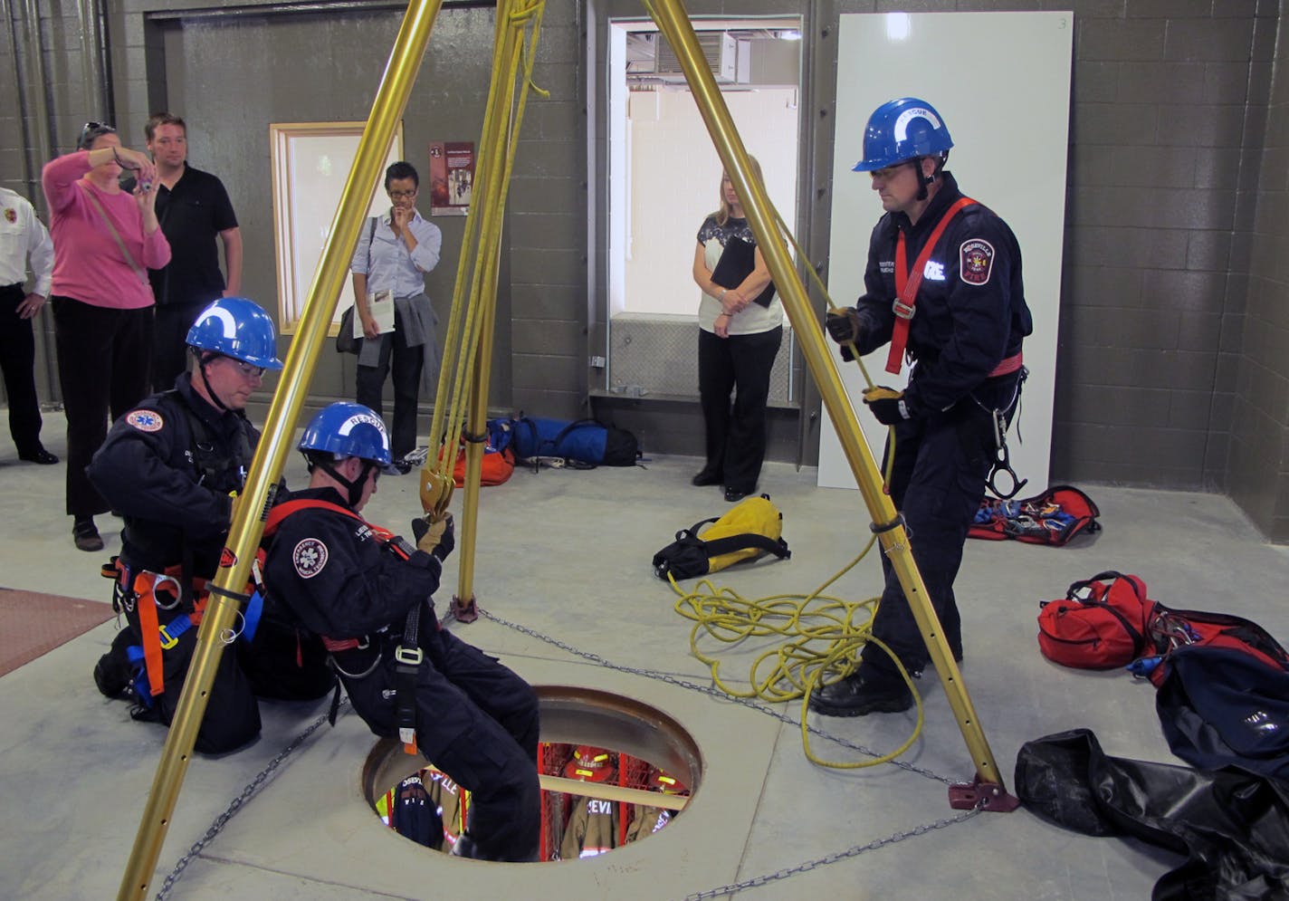 ROSE2: The design of Roseville&#x201a;&#xc4;&#xf4;s new fire station incorporates features allowing firefighters to train on-site, rather than going somewhere else. Here, a hole in the ceiling of an equipment storage room allows them to practice rescuing someone from a narrow space using pulleys and ropes.