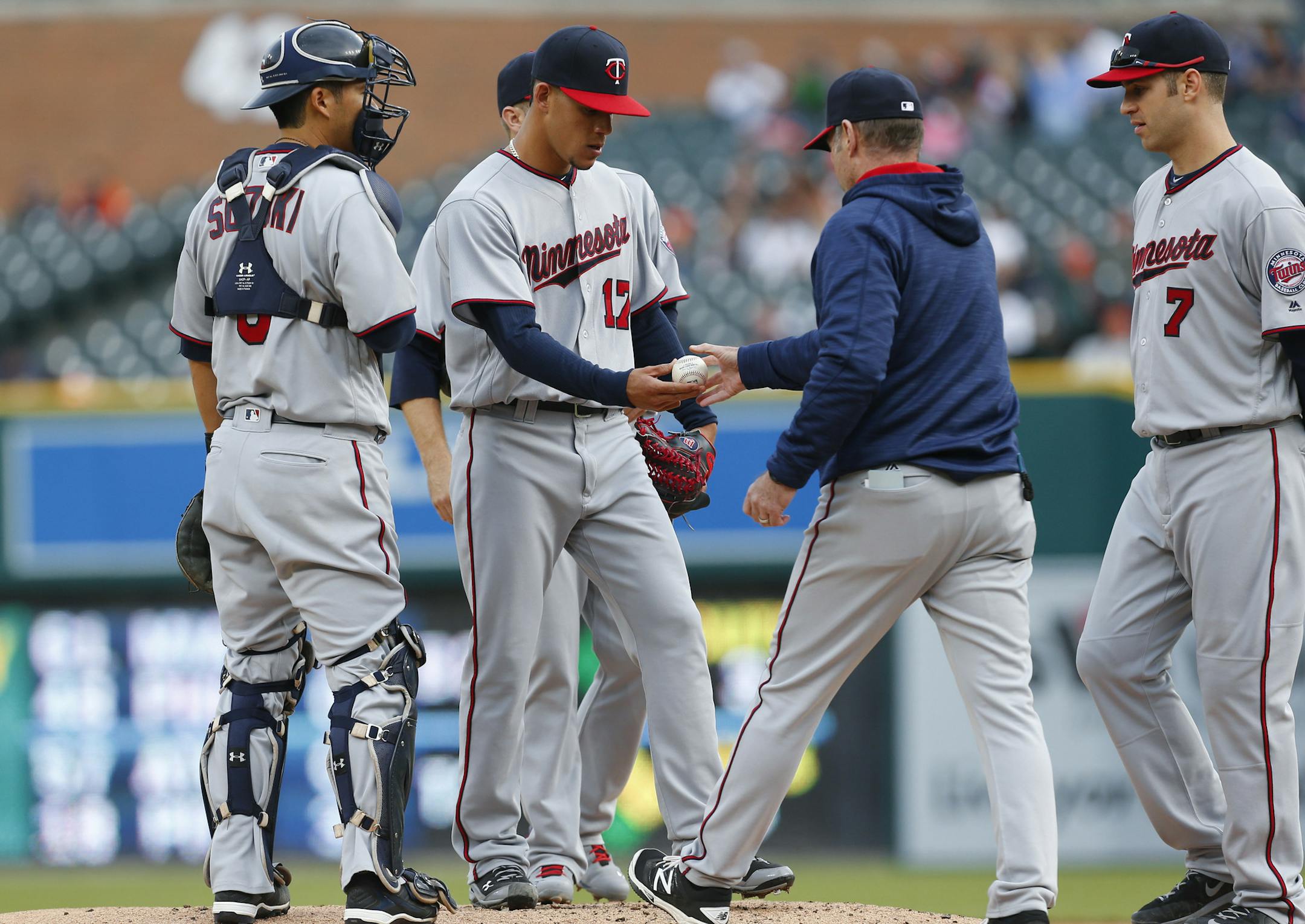 Twins manager Paul Molitor, right, took the ball from pitcher Jose Berrios against the Tigers in the first inning Monday.
