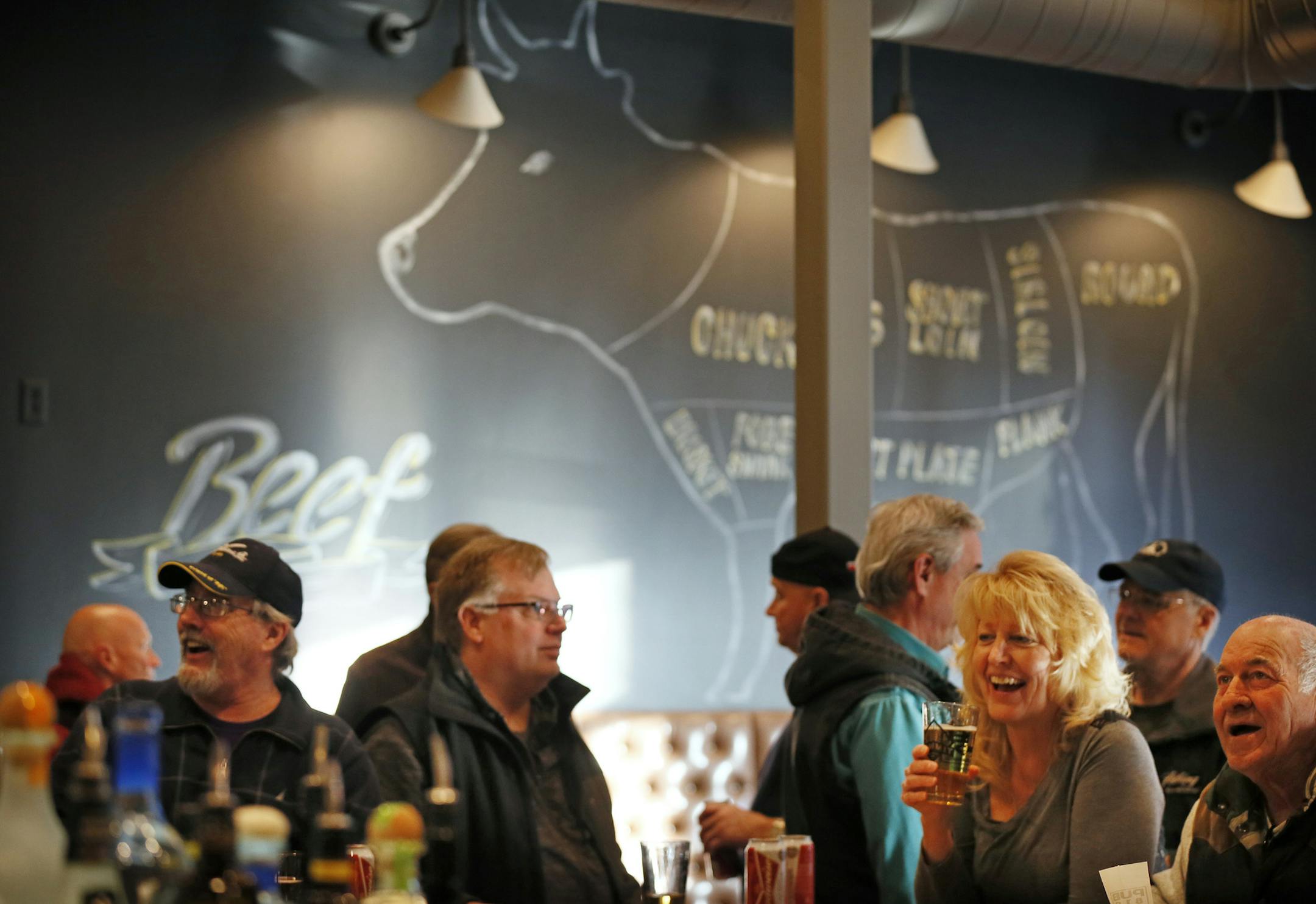 It's "whiskey, beer, burgers" at downtown Hopkins' Pub 819.