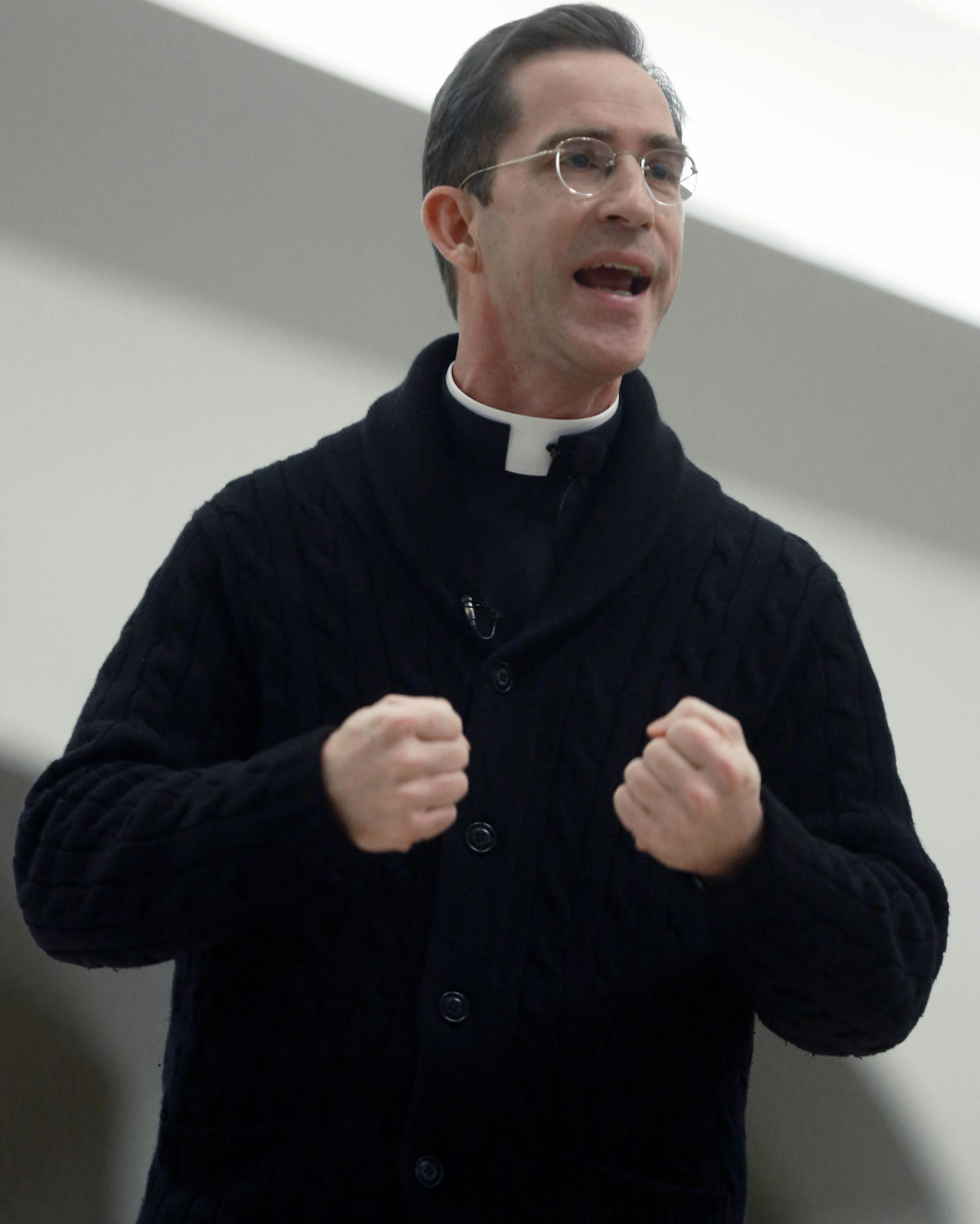 In this Feb. 7, 2013 photo, Rev. Peter Laird, who is the Vicar General of the Archdiocese of St. Paul, speaks about Catholics needing to create a deeper relationship with God at Our Lady of Grace Catholic Church in Edina, Minn. Rev. Peter Laird resigned Thursday, Oct. 3, 2013 amid fresh criticism of how top church officials handled cases of priests accused of sexual abuse. (AP Photo/The Star Tribune, Richard Tsong-Taatarii) MANDATORY CREDIT; ST. PAUL PIONEER PRESS OUT; MAGS OUT; TWIN CITIES TV O