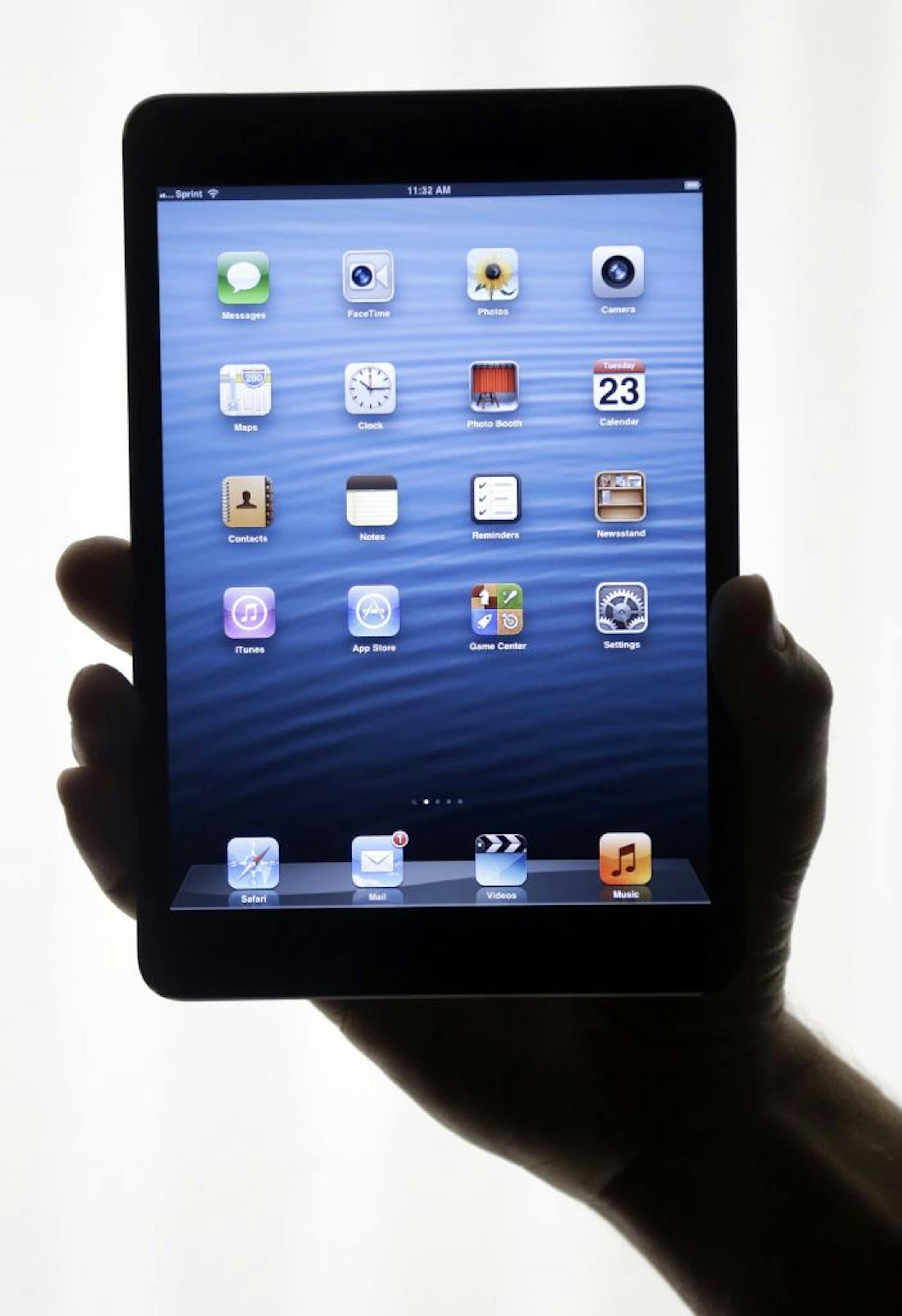 The iPad Mini is shown in San Jose, Calif., Tuesday, Oct. 23, 2012. Apple Inc. is refusing to compete on price with its rivals in the tablet market, t's pricing its new, smaller iPad well above the competition. On Tuesday, the company revealed the iPad Mini, with a screen that's about two-thirds the size of the full-size model, and said it will cost $329 and up.