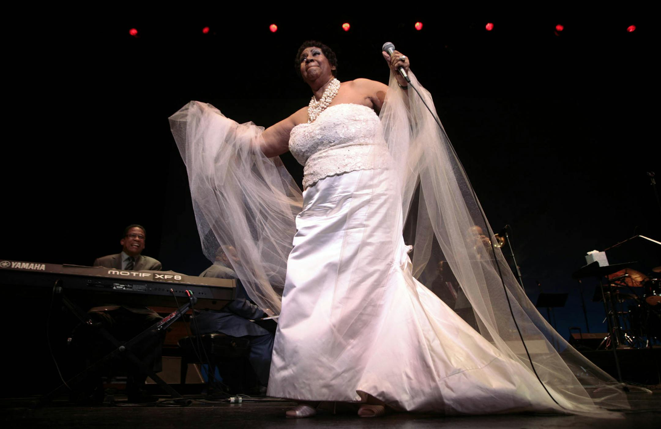 FILE -- Aretha Franklin is accompanied by Herbie Hancock, left, as she performs at the Kennedy Center for the Performing Arts in Washington on Sept. 12, 2011. Franklin, universally acclaimed as the ìQueen of Soulî and one of Americaís greatest singers in any style, died on Aug. 16, 2018, at her home in Detroit, her representative, Gwendolyn Quinn, said. She was 76. (Andrew Councill/The New York Times)