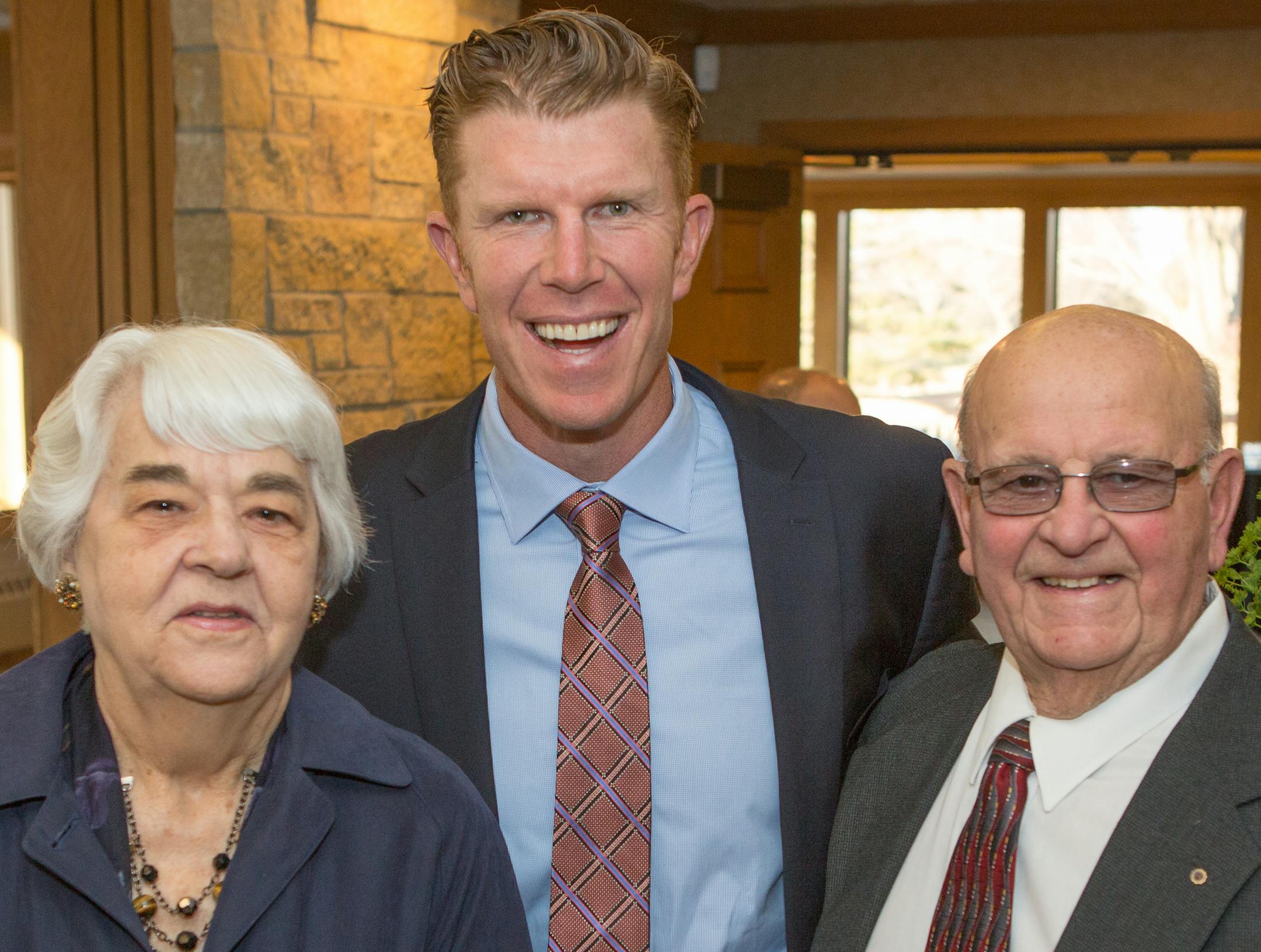 Cay and Dick Kasel with Matt Birk, center.