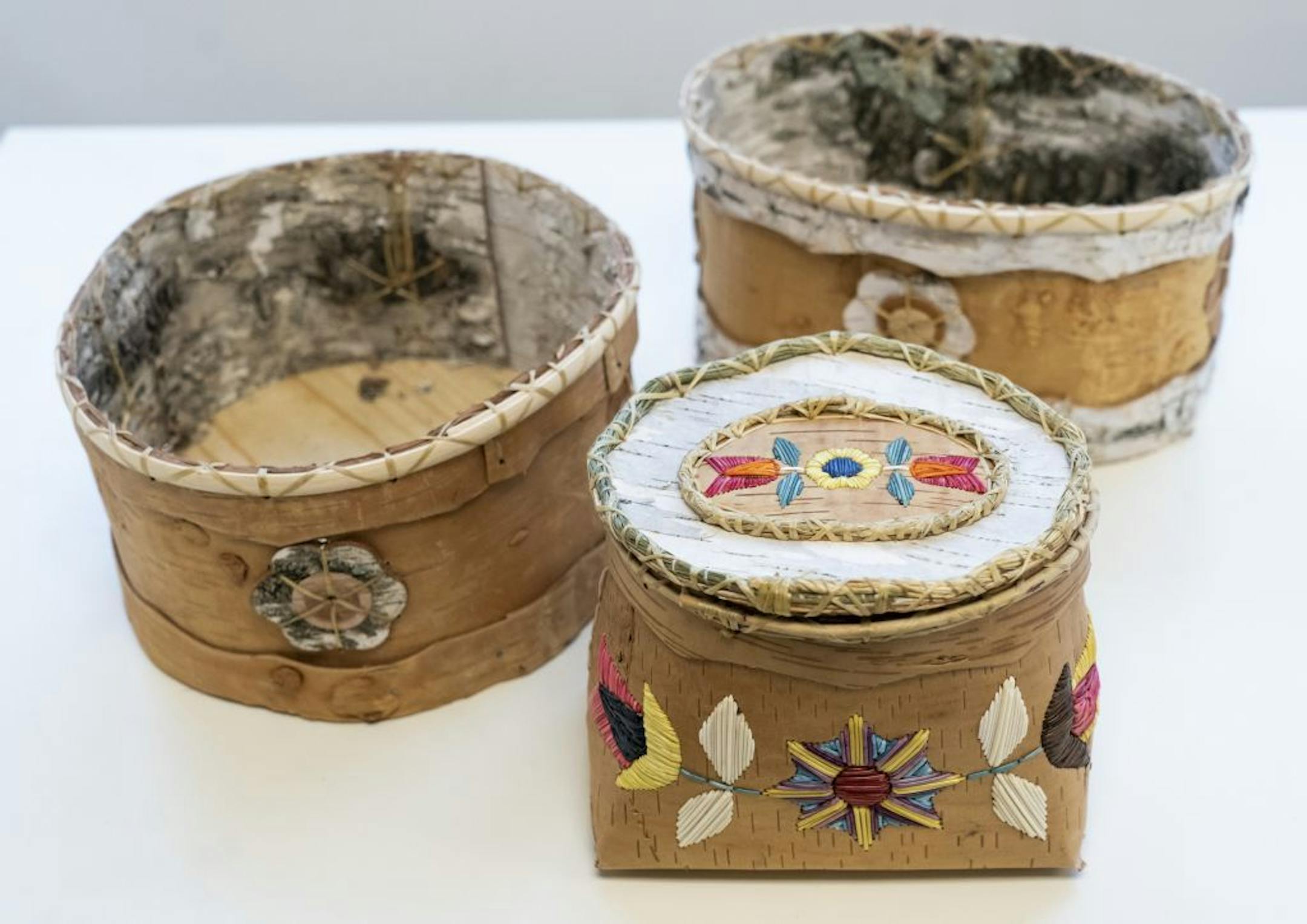 Pat Kruse is one of the few artists to use porcupine quills in his work ($2,500). The Ojibwe floral baskets are $55 and $75.