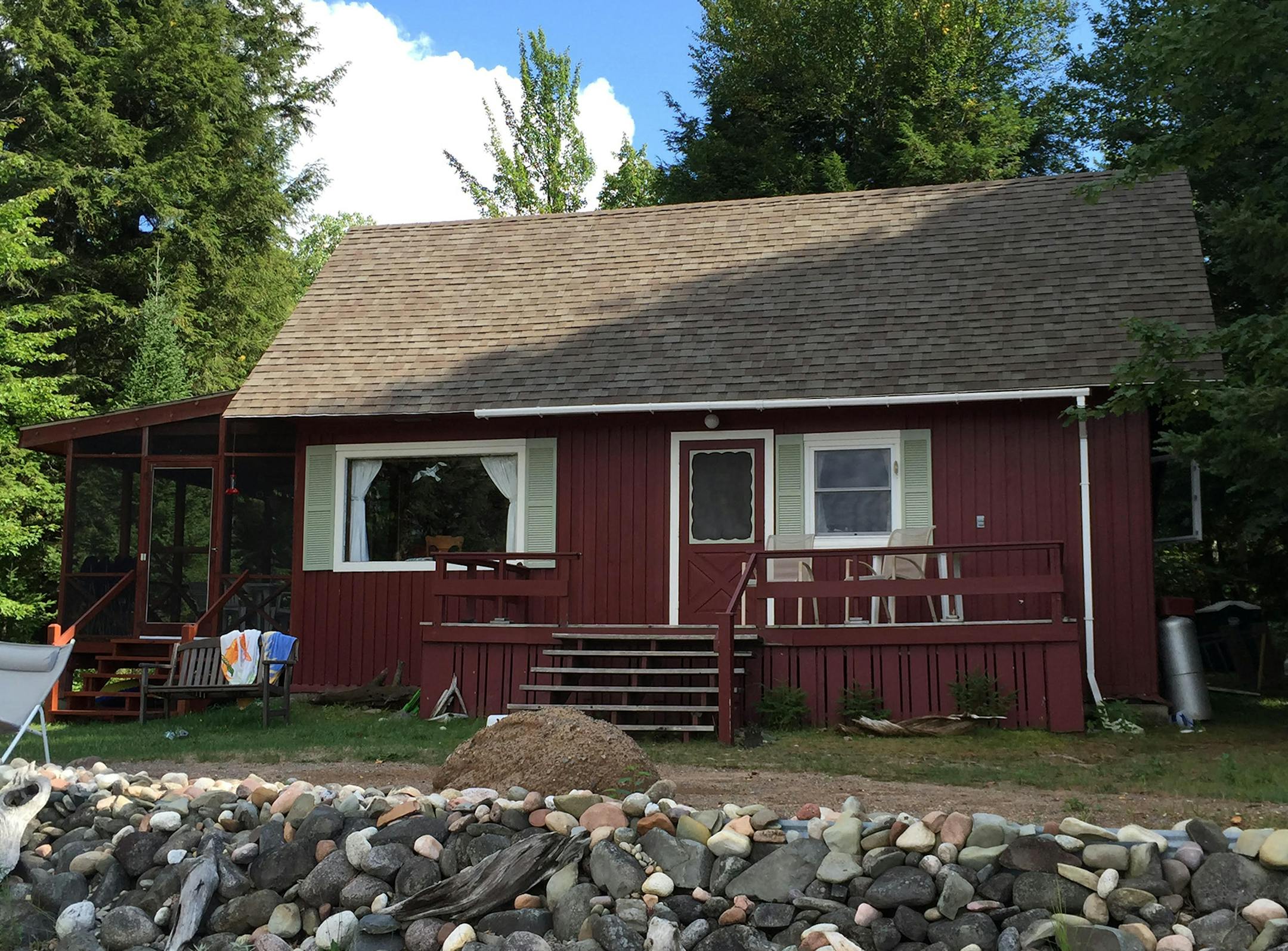 The cabin was constructed with old shelving retreived with a truck that was returning to Chicago.
