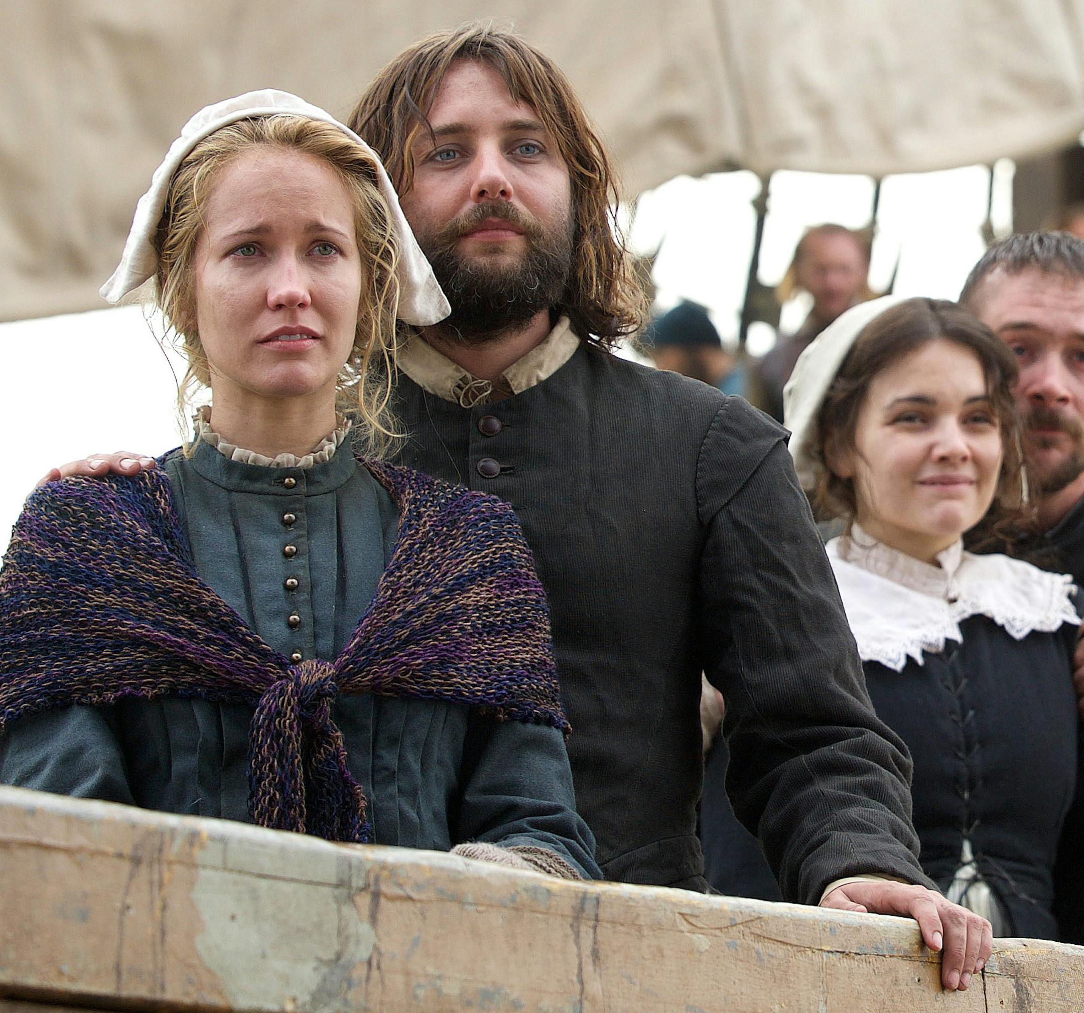 Anna Camp (Dorothy Bradford), William Kartheiser (William Bradford), Maria Vos (Elizabeth Winslow) and Barry Sloane (Edward Winslow) onboard the Mayflower in National Geographic Channel's upcoming movie event "Saints & Strangers," premiering this fall. (photo credit: National Geographic Channels/David Bloomer)