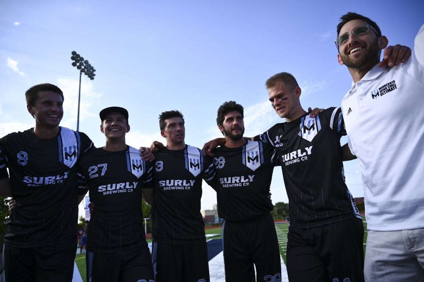 Minnesota Wind Chill head coach Ben Feldman, far right, gave the team some final instructions and encouragement before they played the Buzz Bullets from Japan on July 31 at Sea Foam Stadium in St. Paul.