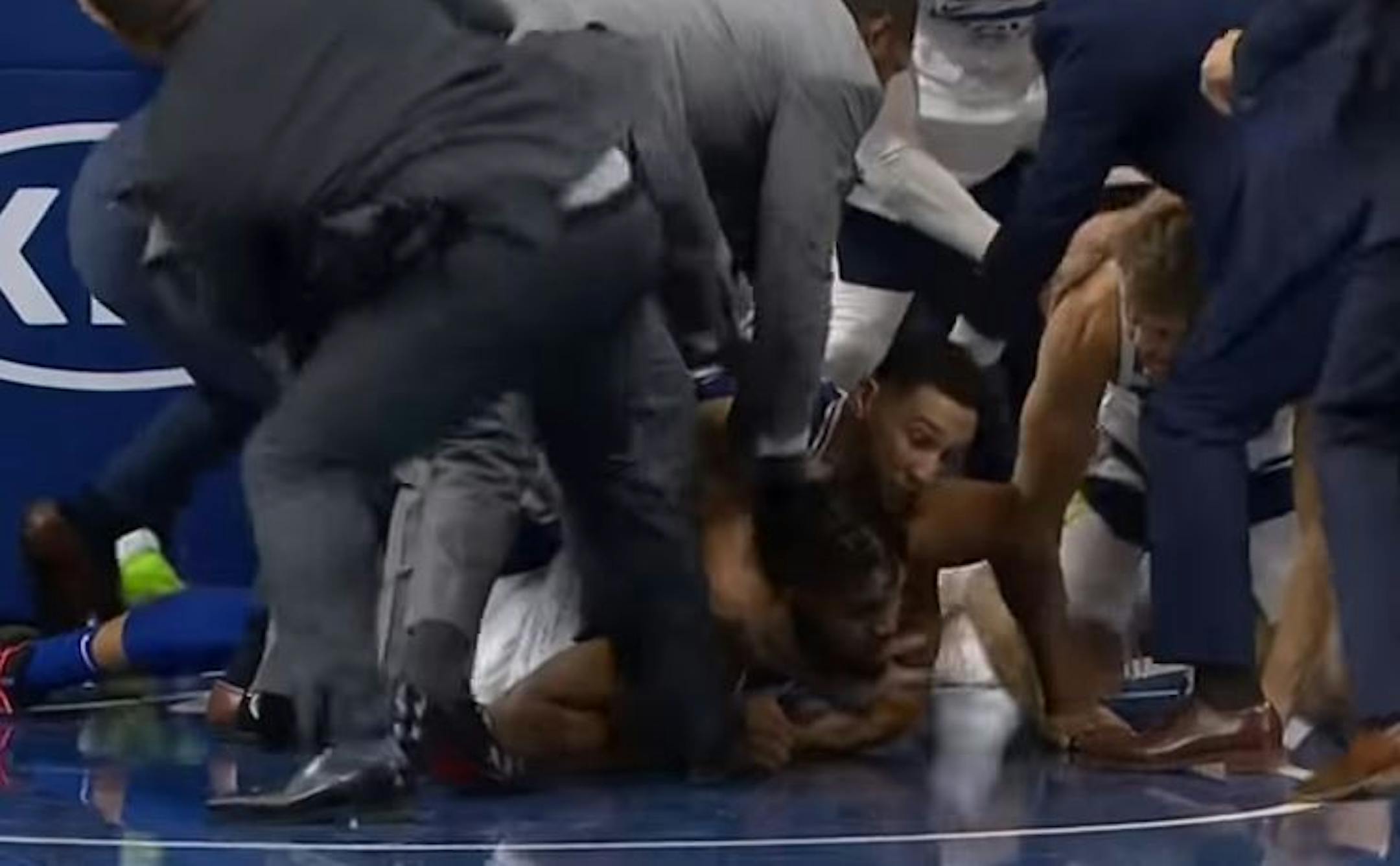 Ben Simmons wrestled with Karl-Anthony Towns after the initial fight between Towns and Joel Embiid.