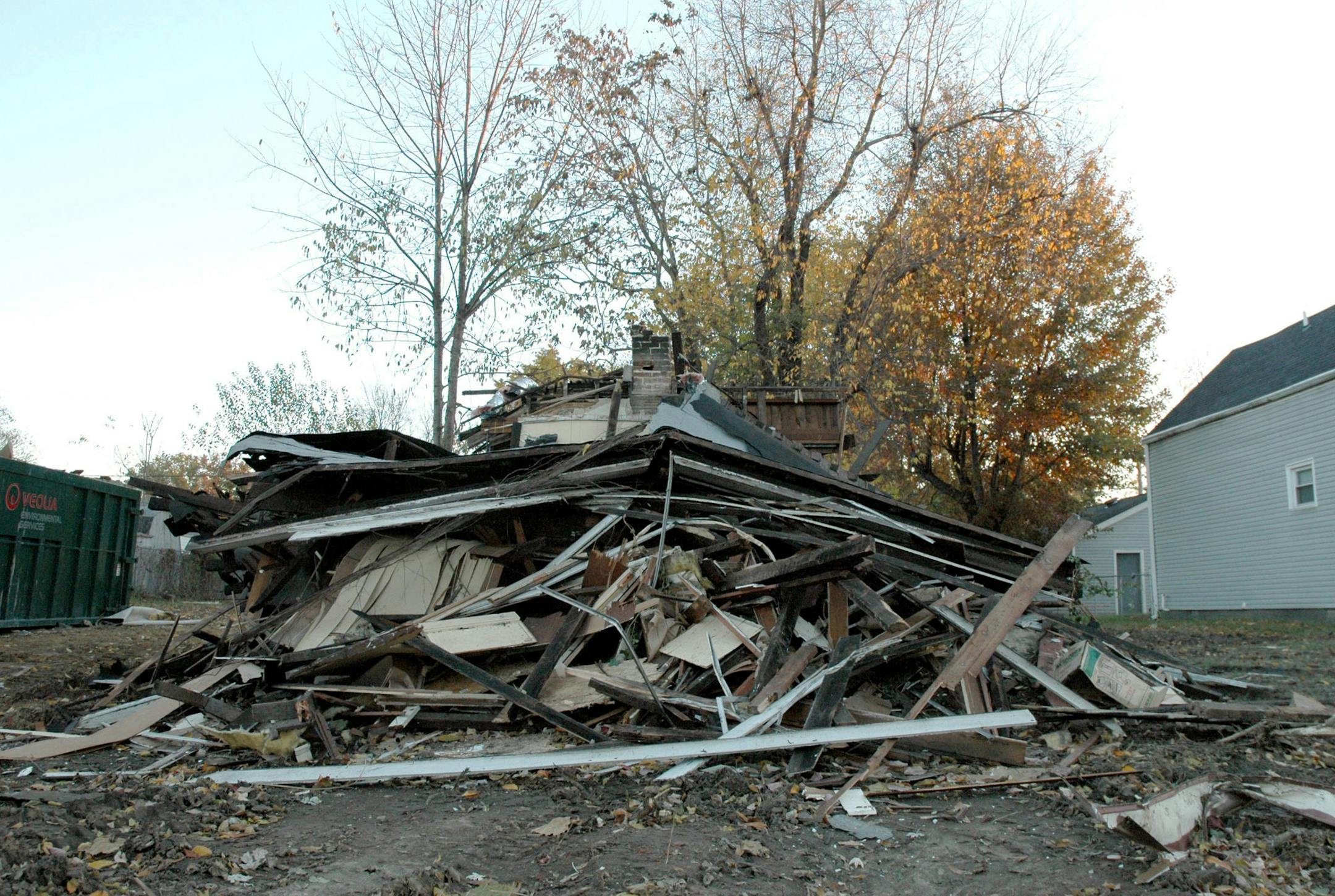 ADVANCED FOR SUNDAY DEC, 8 AND THEREAFTER A demolished house is seen in the 100 block of West Delaware St. in Evansville, Ind. on Nov. 9, 2013. (AP Photo/The Evansville Courier & Press, Jay Young) ORG XMIT: MIN2013121816453474