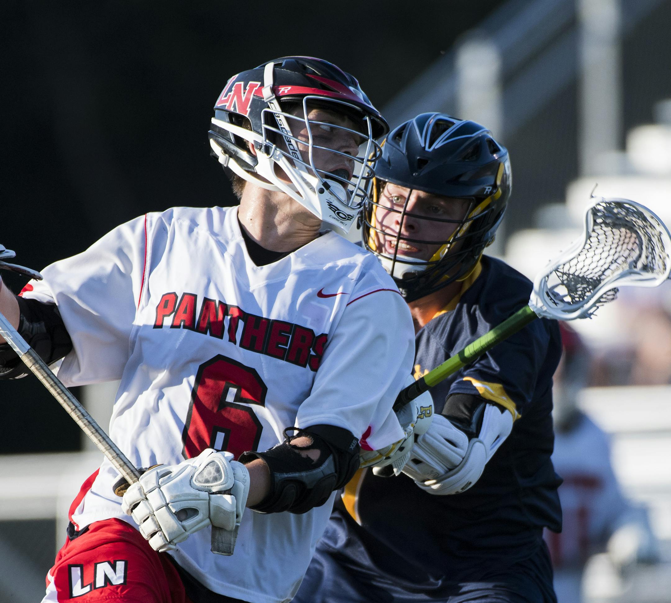 Lakeville North midfielder Robby Gale (6) is tightly contested by Prior Lake midfielder Jack Dessler (7) as he runs upfield. ] Isaac Hale • isaac.hale@startribune.com The Prior Lake Lakers took on the Lakeville North Panthers in the 2016 Minnesota State High School Boys Lacrosse Championship at Chanhassen High School on Saturday, June 18, 2016.