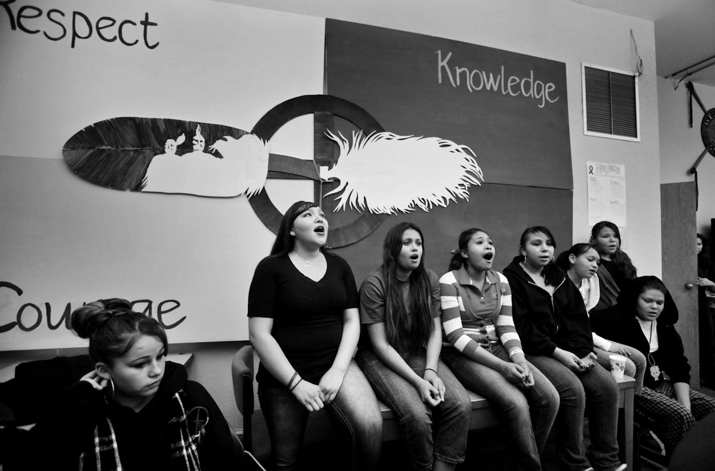 Through a women's health class, Native American girls at�Nawayee Center School in Minneapolis are learning positve lessons about self-esteem and respect. They're also learning about abuse and how and when to walk away from unhealthy relationships. And they're finding their voices in culture class through traditional Indian drumming and singing - usually reserved for males - so that these girls can one day become strong women. In this photo:] Girls in culture class sing a ballad written by classm