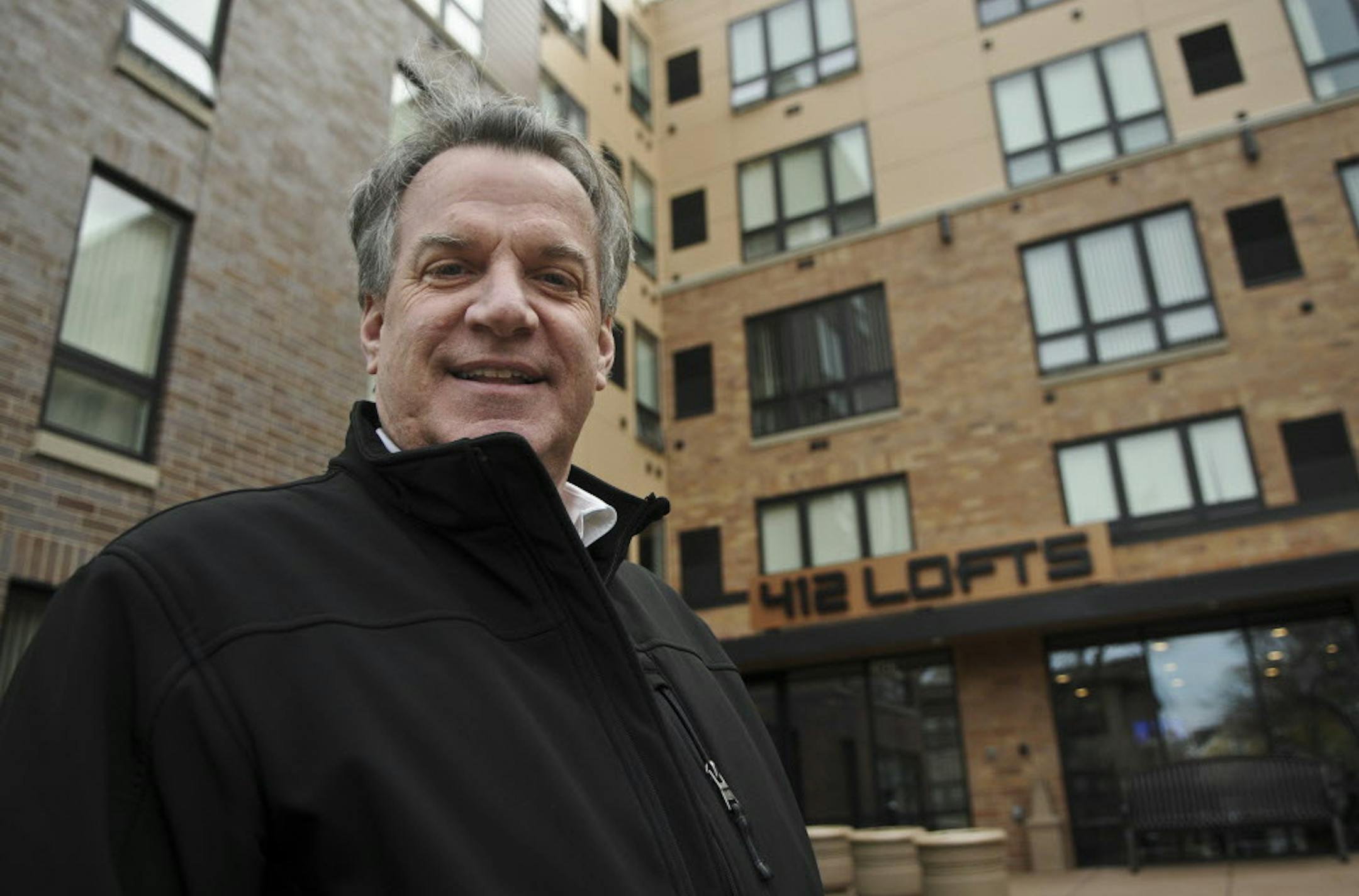Kelly Doran is a veteran Minneapolis real estate developer and one of his latest projects is the 412 Lofts at the corner of 4th St SE and 12th Ave SE in Dinkytown, he posed for this portrait on Wednesday November 2, 2011] Richard Sennott/Star Tribune. Richard.Sennott@startribune.com Minneapolis Minn. Tuesday 11/2/11) ** Kelly Doran (cq)
