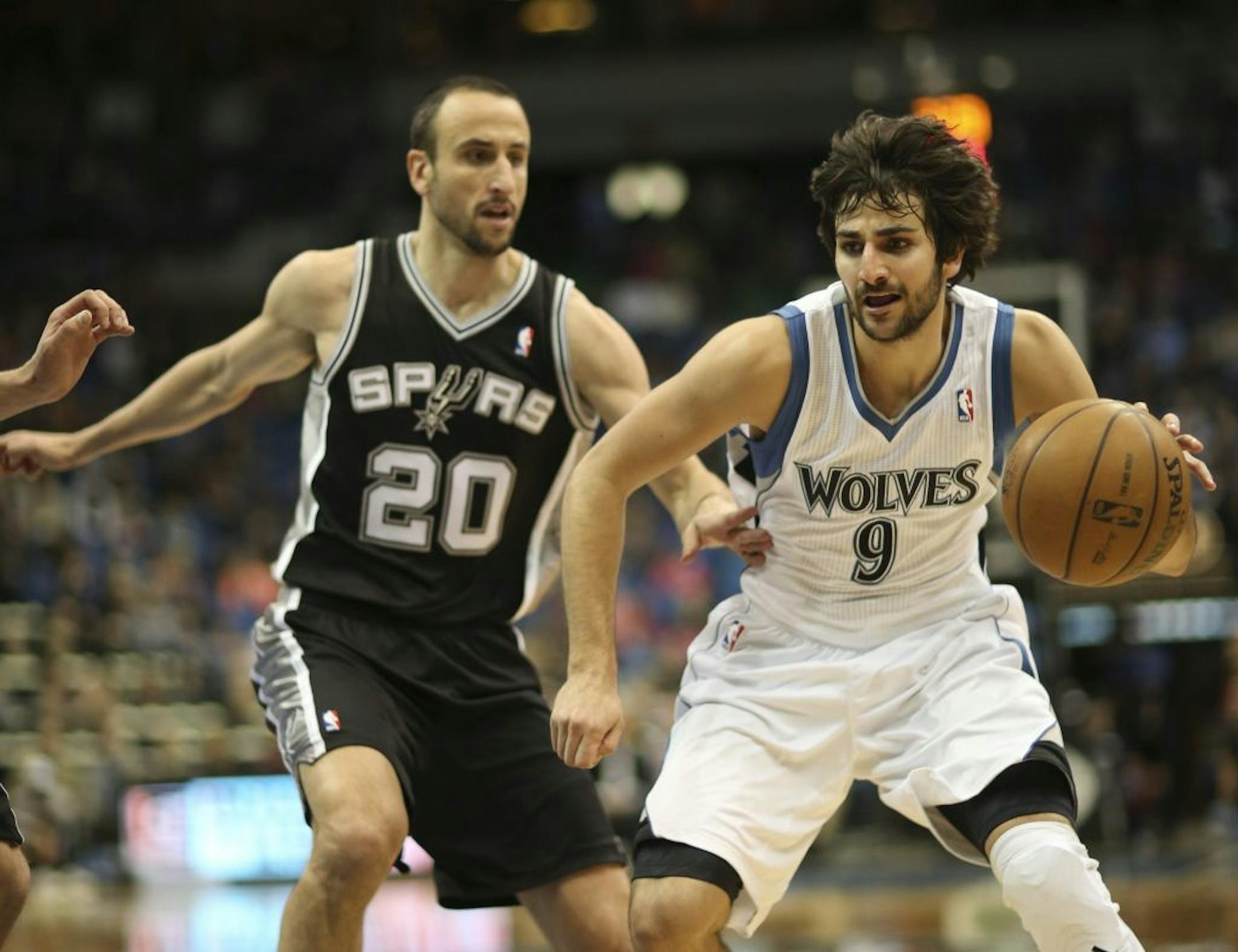 Ricky Rubio drove to the net in the second quarter trailed by San Antonio's Manu Ginobili.