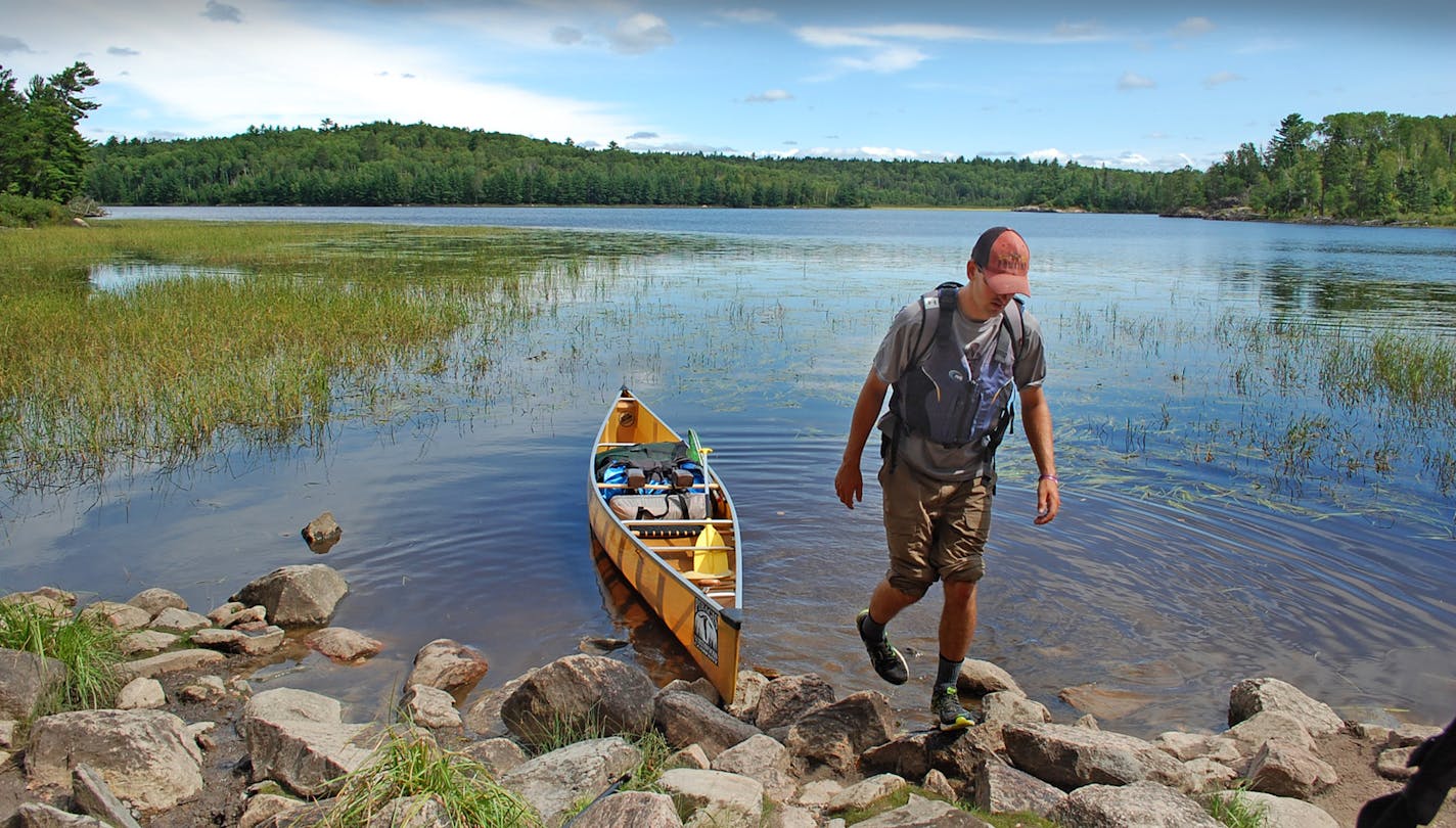 A first-timer enjoys his Boundary Waters Canoe Area Wilderness experience in this file photo.