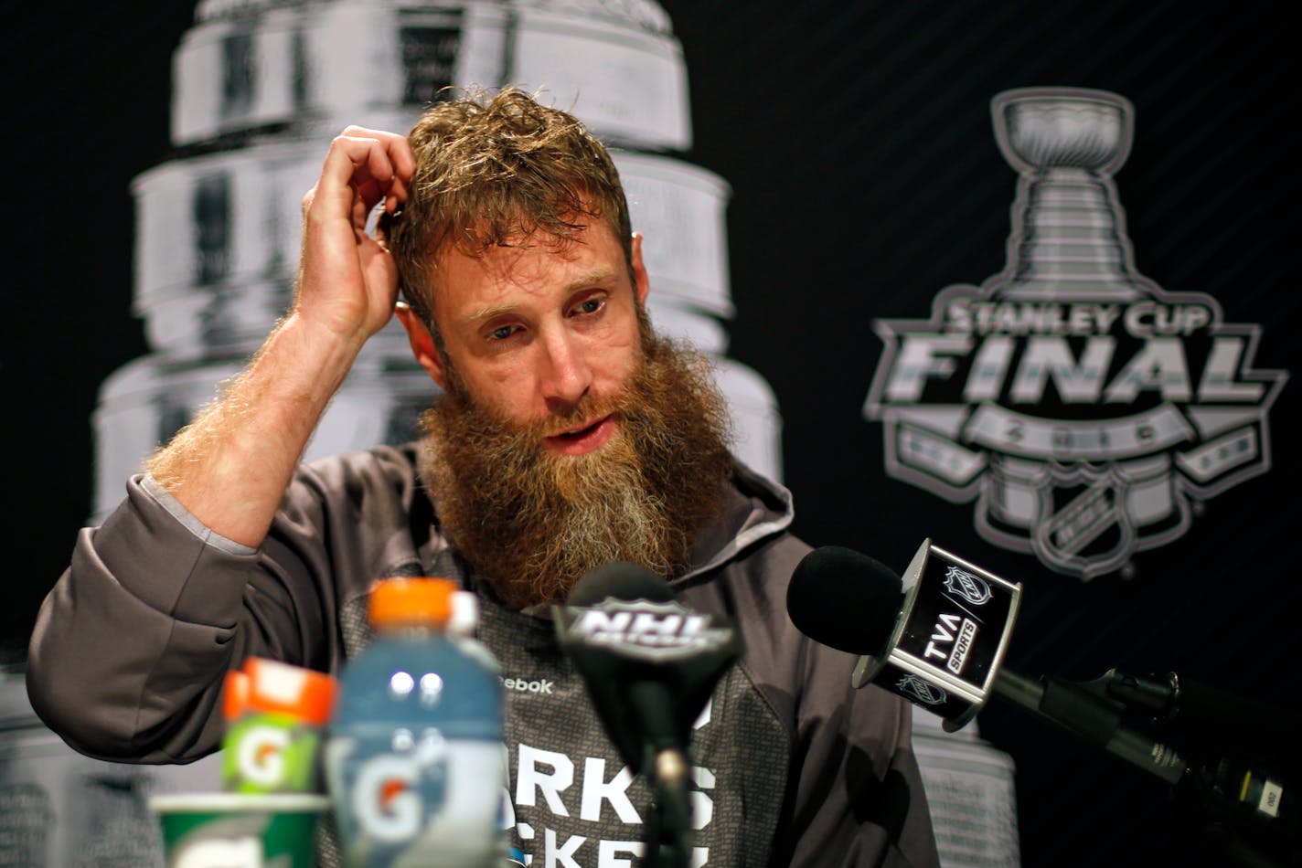 San Jose Sharks' Joe Thornton talks to reporters during Stanley Cup Finals Media Day at the Consol Energy Center in Pittsburgh, Sunday May 29, 2016. The Sharks face-off in Game 1 of the Stanley Cup Finals against the Pittsburgh Penguins on Monday, May 30, in Pittsburgh. (AP Photo/Gene J. Puskar)