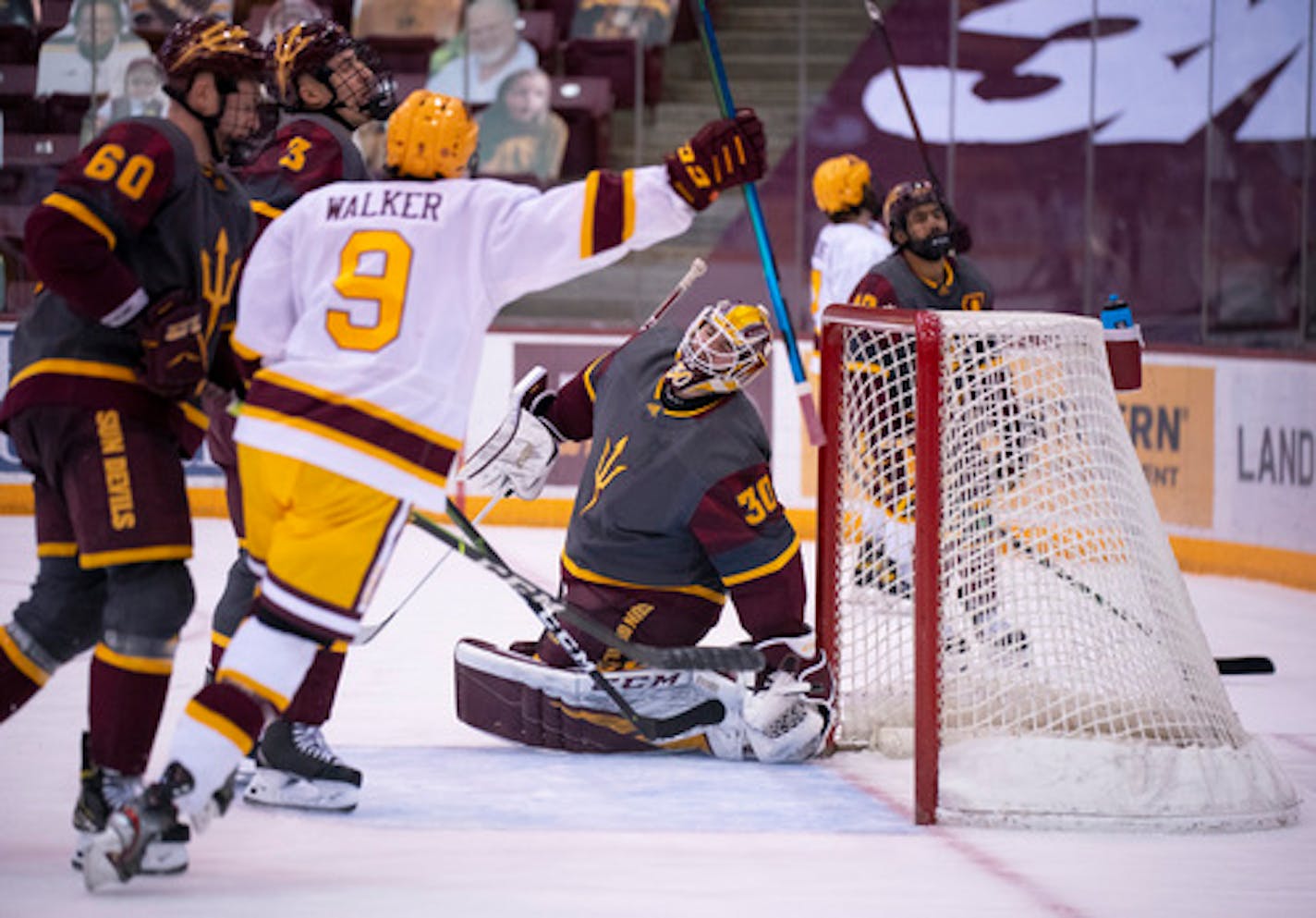 Minnesota Gophers center Sammy Walker (9) celebrated and Arizona State Sun Devils goaltender Evan Debrouwer (30) winced after he was scored on by Gophers right wing Brannon McManus (7) rear, in the third period. ] JEFF WHEELER • jeff.wheeler@startribune.com