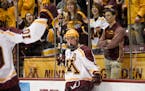Minnesota Golden Gophers forward Mike Szmatula (9) celebrated a first period goal against the Wisconsin Badgers.