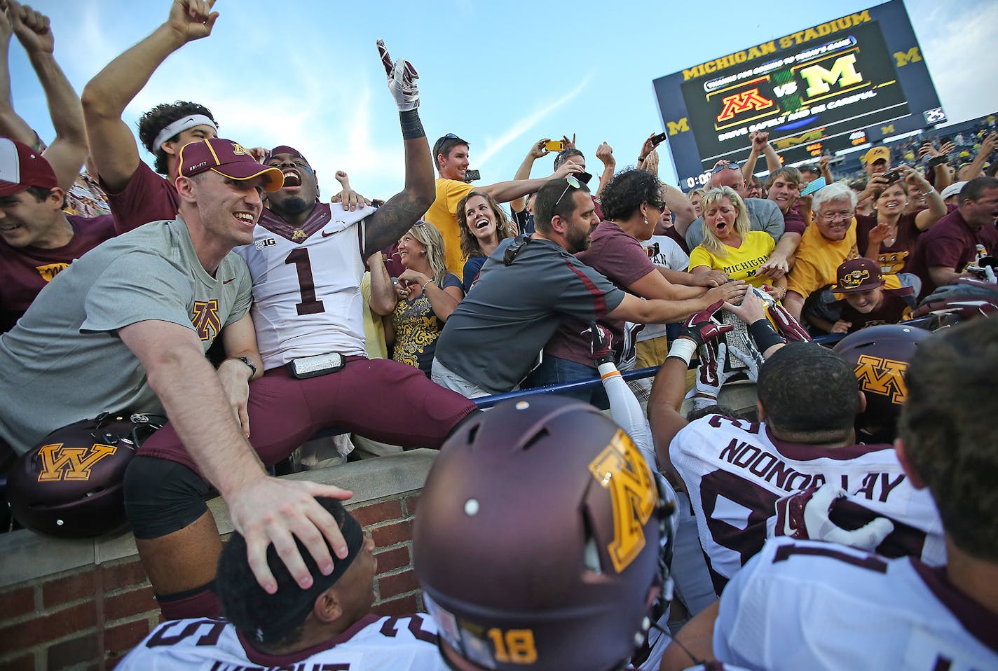 Gophers players and fans all sought to see and be seen with the Little Brown Jug after a rare 30-14 victory over Michigan last year.