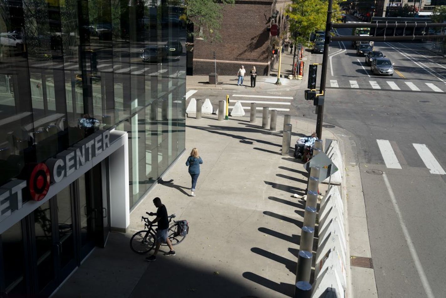 Barricades lined First Avenue in front of the Target Center in Minneapolis, Minn., on Tuesday, October 8, 2019, ahead of Pres. Donald Trump's planned rally Thursday. At the far right is Dan Nelson, of Spring Lake Park, who set up a chair in front of Target Center ahead of the rally to be first in line. Nelson wanted to show President Trump how thankful he was "for what he is doing for America" by being the first supporter in the door Thursday. He planned to sleep over night until the event. Nels