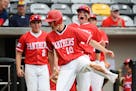 Lakeville North infielder Nathaniel Anderson (10) celebrated scoring a run in the top off the seventh inning against Northfield off an RBI hit by seco