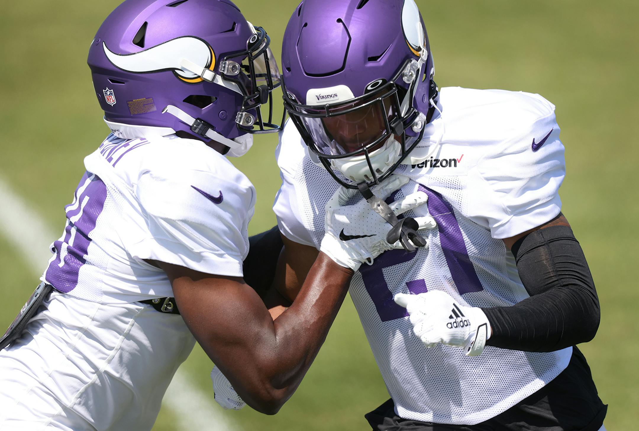 Minnesota Vikings Jeff Gladney (20) and Mike Hughes (21) during practice on Tuesday.