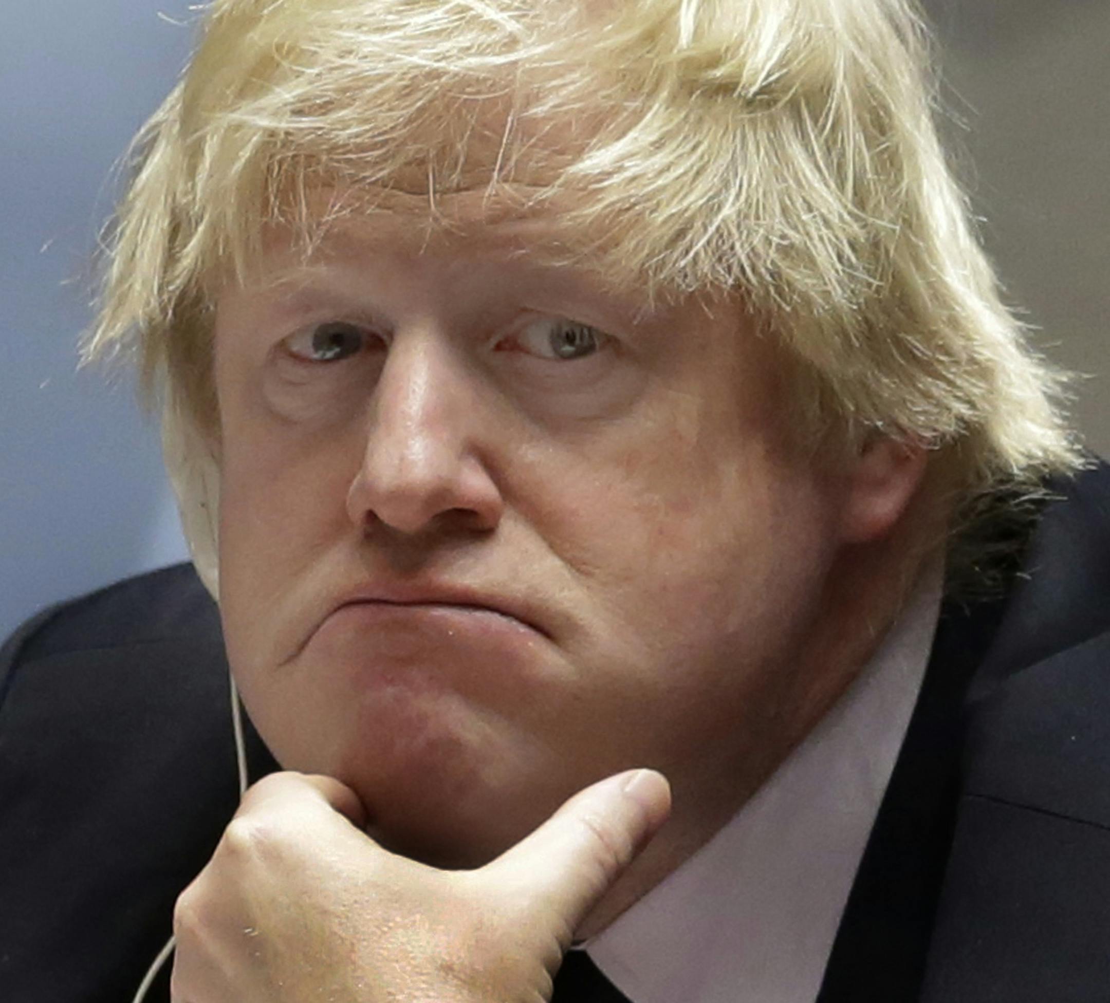 FILE - In this Thursday, March 23, 2017 file photo Britain's then Foreign Minister Boris Johnson listens to delegates in the United Nations Security Council on Somalia. Johnson, who visited Somalia last week, chairs a U.N. Security Council meeting on the humanitarian and political situation in the Horn of Africa nation. (AP Photo/Richard Drew, File)