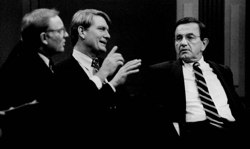 Arne Carlson, left, and Jon Grunseth both jump on point made by Governor Rudy Perpich during the 1990 debate on TPT.
