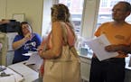 Residents wait for information and to file claims, Wednesday, Sept. 19, 2018, in Andover, Mass., in the wake of last week's gas explosions and fires. 