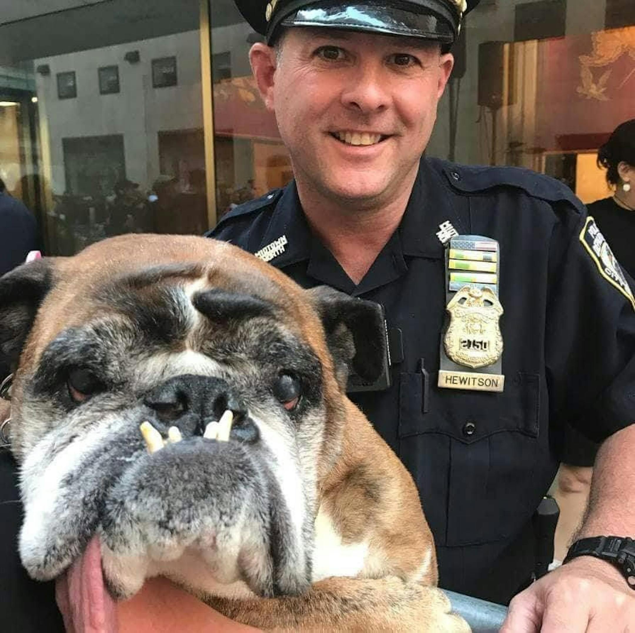 Zsa Zsa posing with a New York City officer during her triumphal tour of the Big Apple.