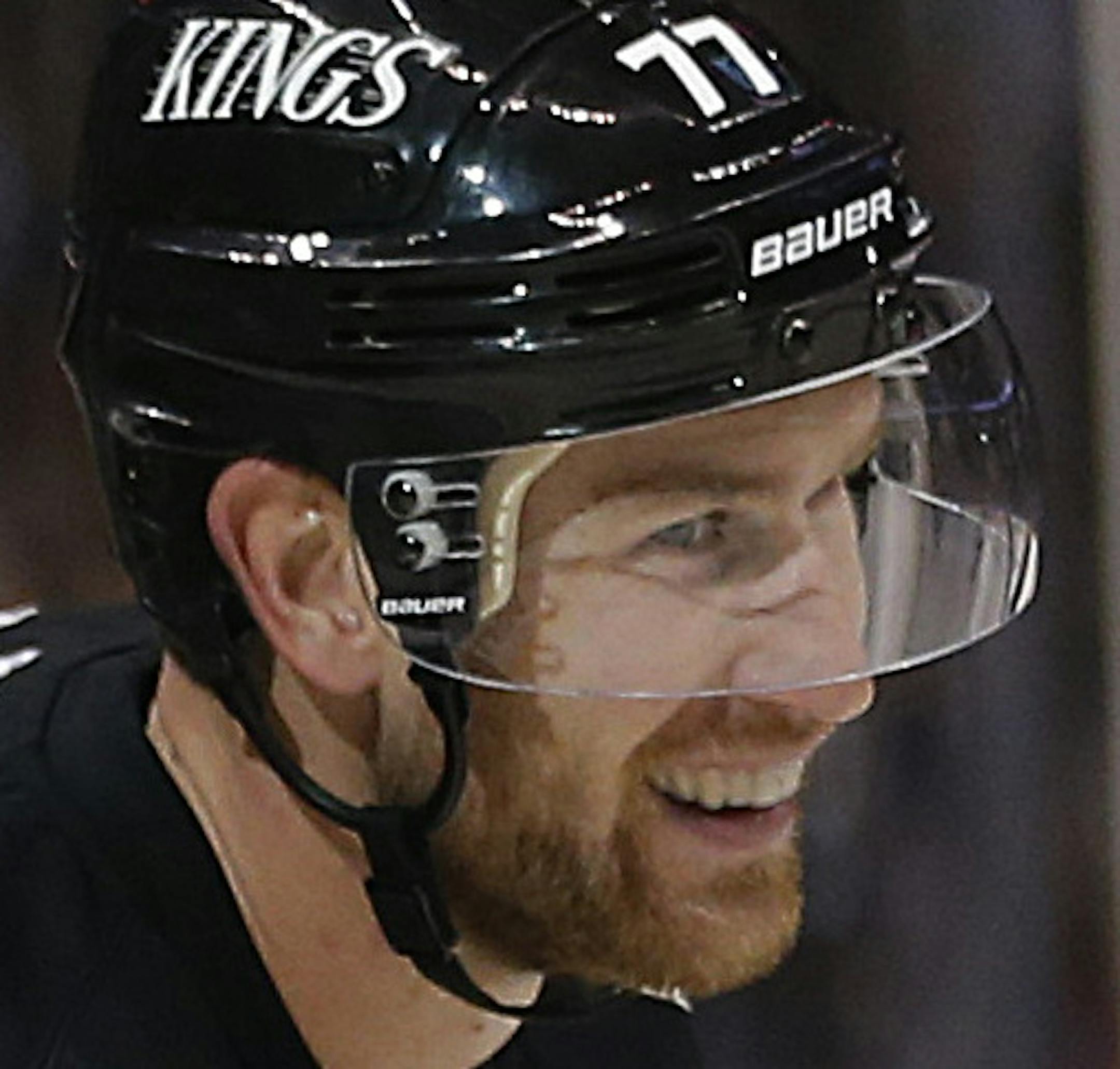 Los Angeles Kings' Jeff Carter smiles after his goal against the Dallas Stars during the second period of an NHL hockey game in Los Angeles, Thursday, March 7, 2013. (AP Photo/Jae C. Hong) ORG XMIT: MIN2013041918415606