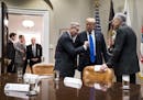 President Donald Trump speaks with Sen. Lindsey Graham (R-S.C.), left, and Sen. Chuck Grassley (R-Iowa) during a meeting on immigration the White Hous