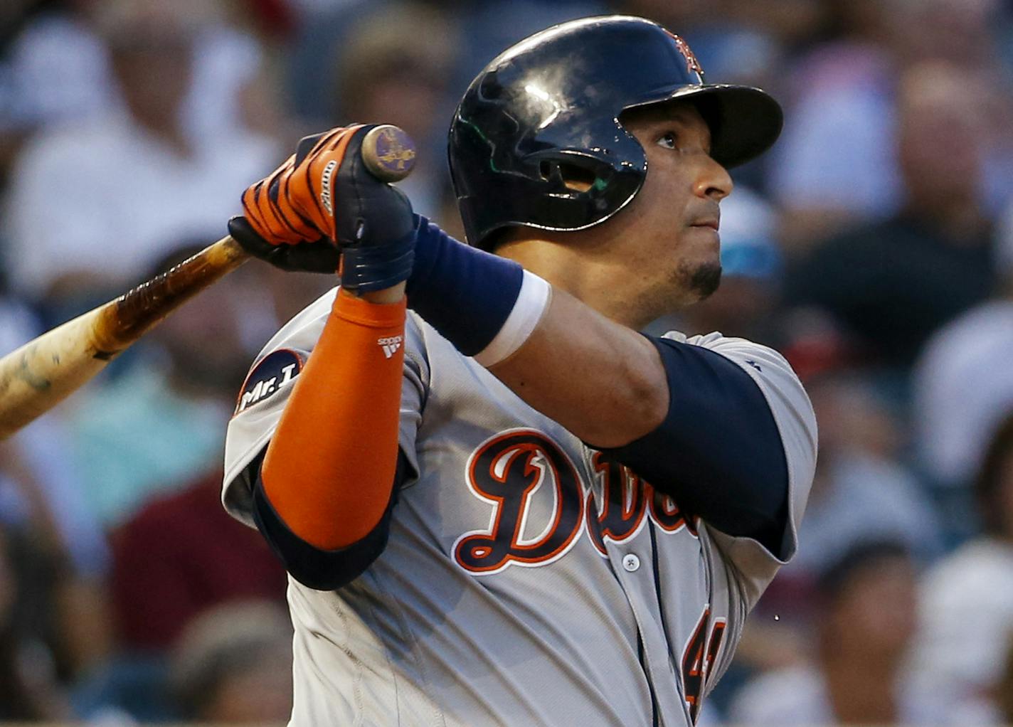 Detroit Tigers' Victor Martinez watches his two-run home run leave the park against the Minnesota Twins in the fourth inning of a baseball game Friday, July 21, 2017, in Minneapolis. (AP Photo/Bruce Kluckhohn)