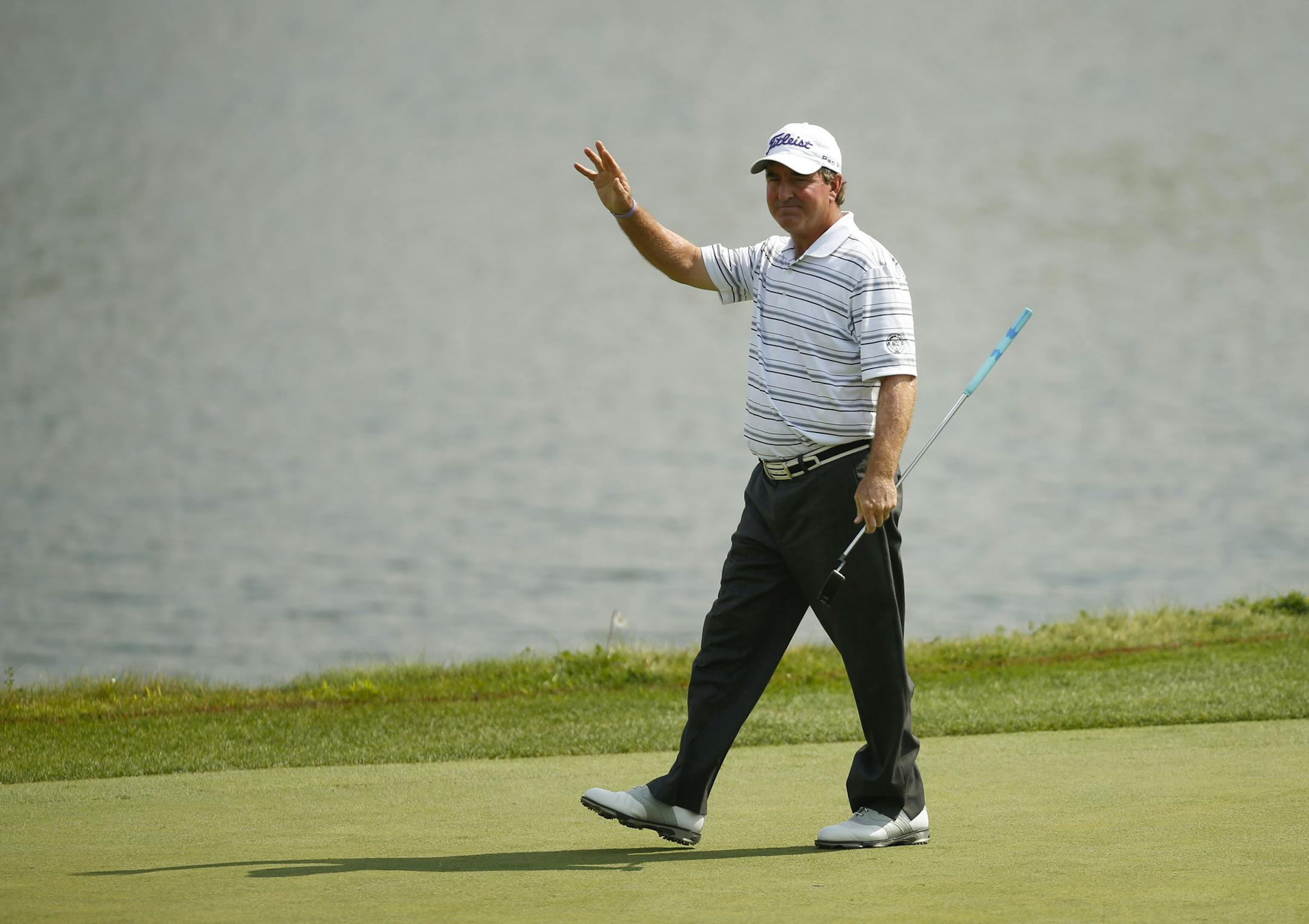 Gene Sauers acknowledged the cheers of the gallery after sinking a putt on the 17th green Sunday afternoon at the TPC in Blaine. ] JEFF WHEELER ‚Ä¢ jeff.wheeler@startribune.com The 3M Championship concluded on Sunday afternoon with Kenny Perry winning by a stroke over a Bernhard Langer at the Tournament Players Club Twin Cities in Blaine August 3, 2014.