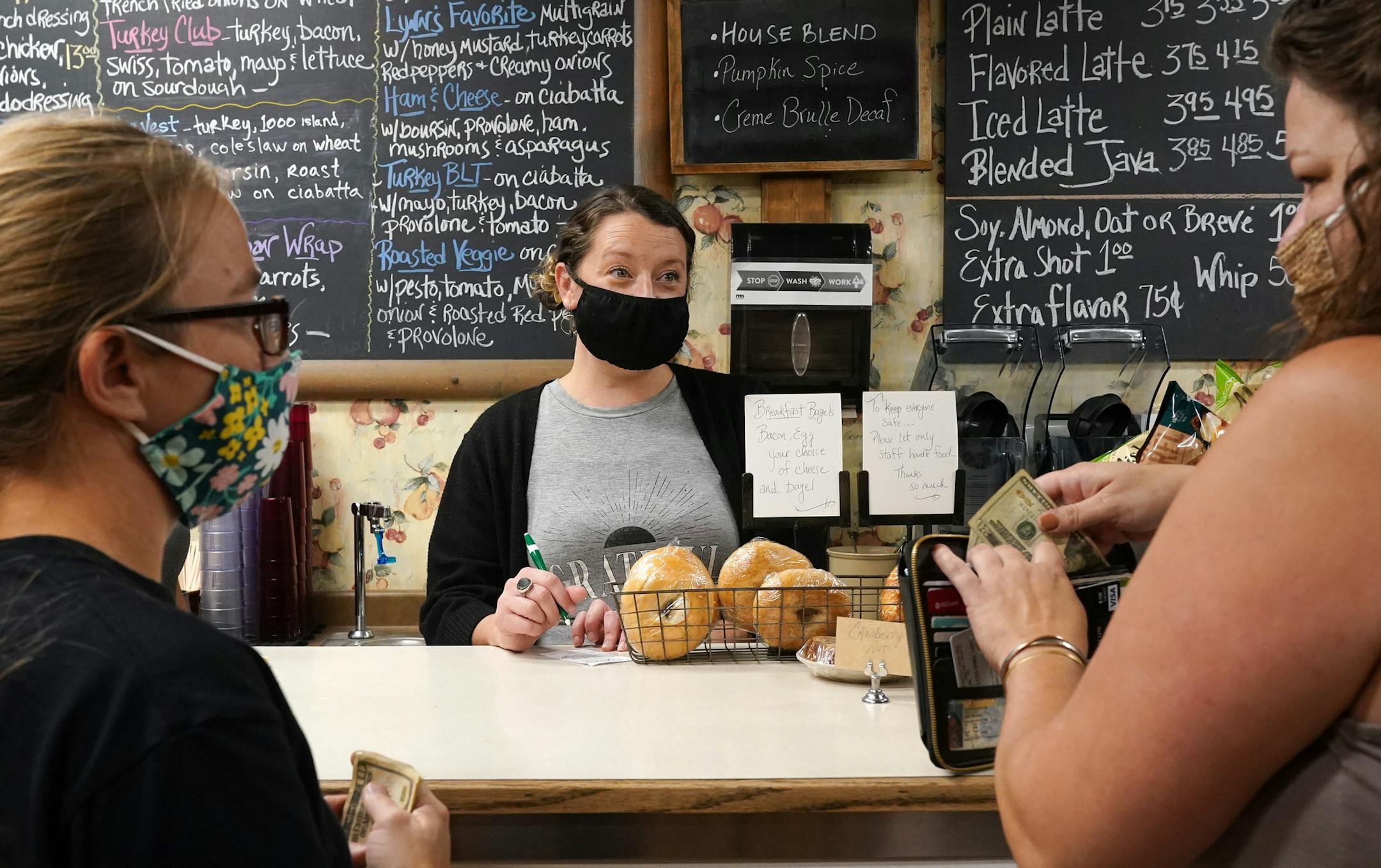 Ashlea Clifton, who moved from Minneapolis to take over the local coffee shop Gathering Grounds in August, took customers orders Wednesday morning. ] ANTHONY SOUFFLE • anthony.souffle@startribune.com Ken Nelson, founder of the Kenny's Candy Company, gave tour Wednesday, Oct. 7, 2020 of the town of Perham, Minn. where they make candy, potato chips and dog food, and their main problem is finding a place to put all the people who have jobs there.