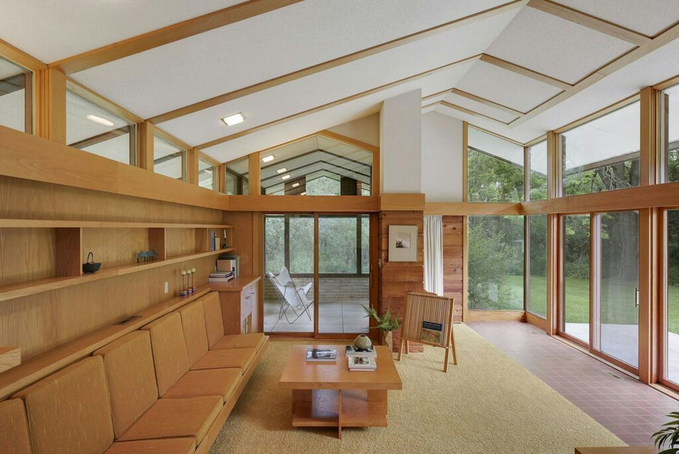 The living room also has a built-in sofa.