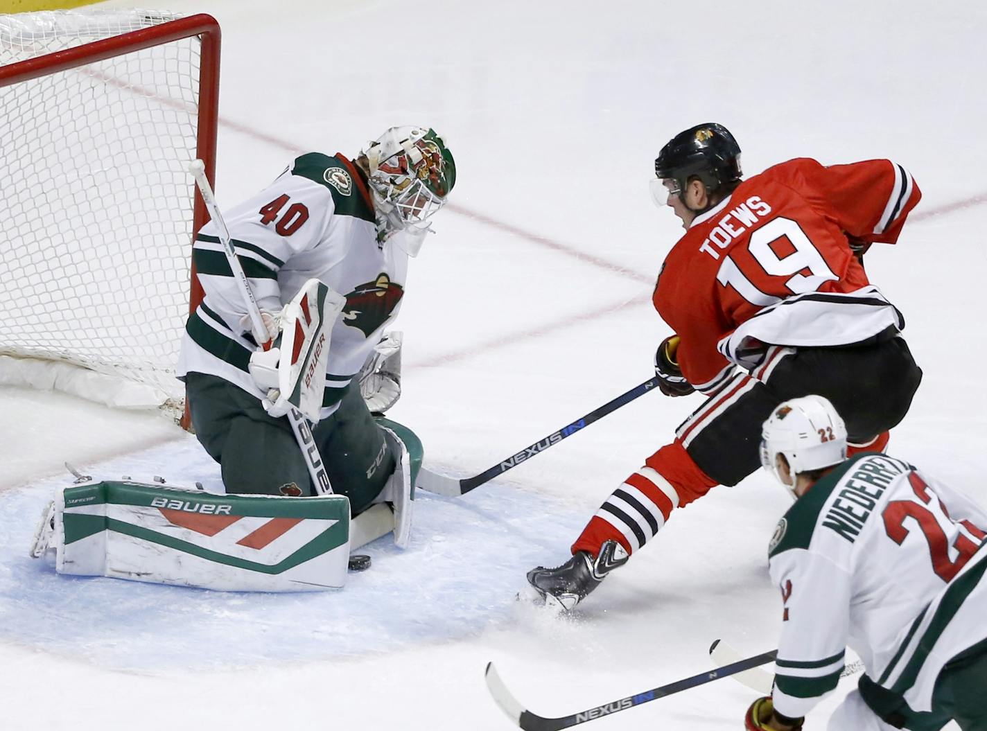 Wild goalie Devan Dubnyk denied Chicago captain Jonathan Toews on a point-blank shot in the first period. Dubnyk made 30 saves.