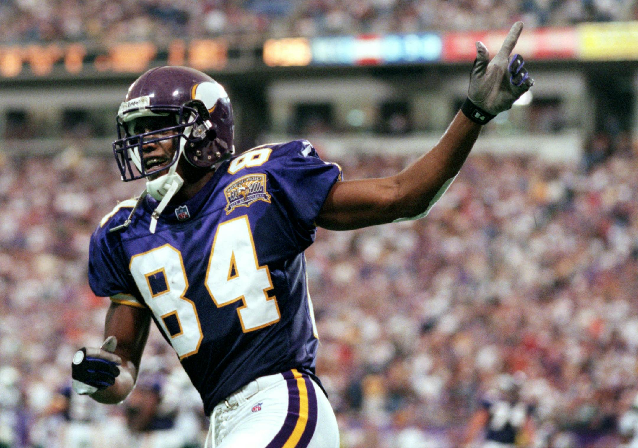 GENERAL INFORMATION: Vikingsvs. Miami Dolphins, Sunday, Sept. 10, 2000
IN THIS PHOTO: Vikingsvs. Miami Dolphins, Sunday, Sept. 10, 2000--Randy Moss reacts after scoring the Vikings only touchdown on Sunday against Miami. ORG XMIT: MIN2017121419322043