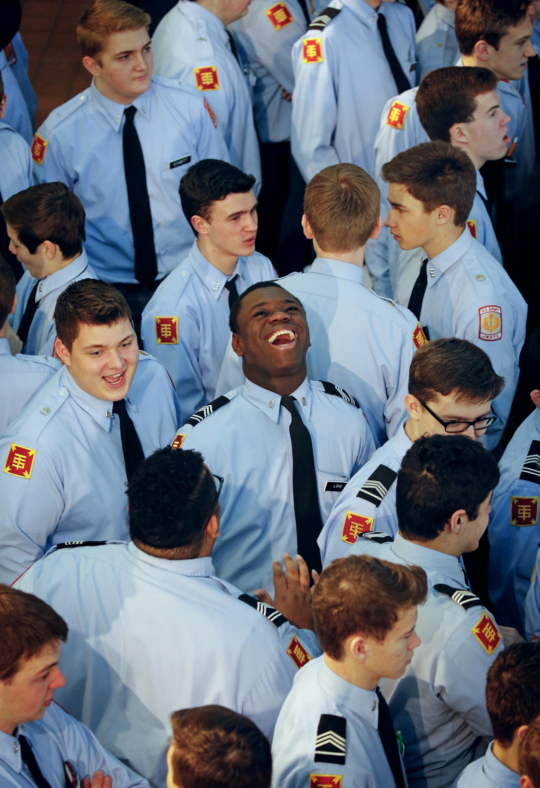 St. Thomas Academy students gather and talk before the morning formation meeting. ] For 99 years, a cornerstone of prestigious St. Thomas Academy, Minnesota’s only military academy, has been its affiliation with JROTC, the Army’s Junior Reserve Officer Training Corps. Every student at the Catholic, all-boys school must be a JROTC member. The school’s uniforms, JROTC instructors and military curriculum all come from the Army, as does some funding. But after this year, that co