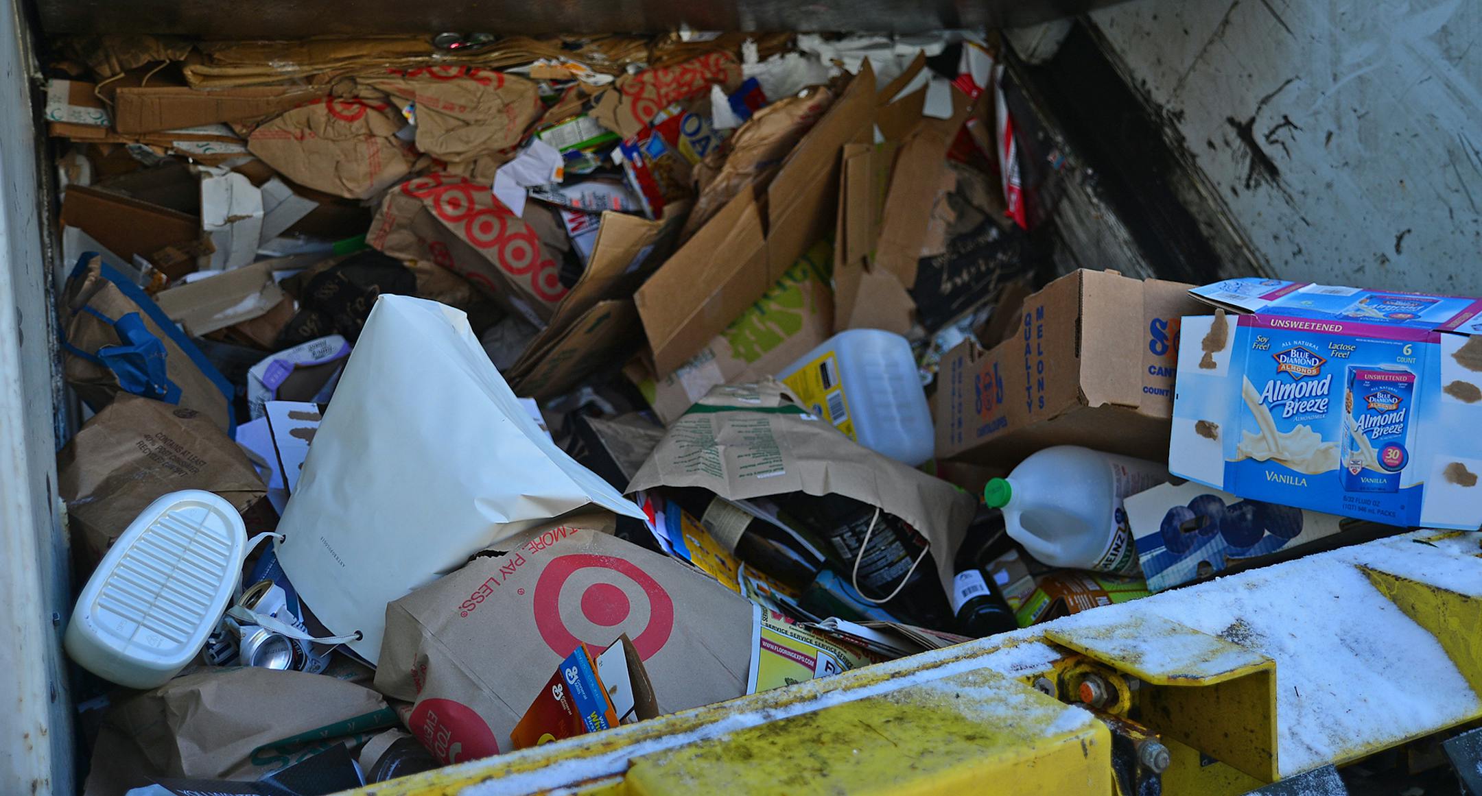 The single-sort recycling system in Minneapolis, will have its one-year anniversary this summer. So far, city data show that recycling worker injuries have dropped significantly since the system was implemented, saving the city about $250,000 so far this year. Jon Mollers has been working in recycling for 27 years , he wears a high visibility jacket and ear plugs. It's still optional to wear eye goggles and today he didn't have to wear ice cleats on his shoes. ] Richard.Sennott@startribune.com R