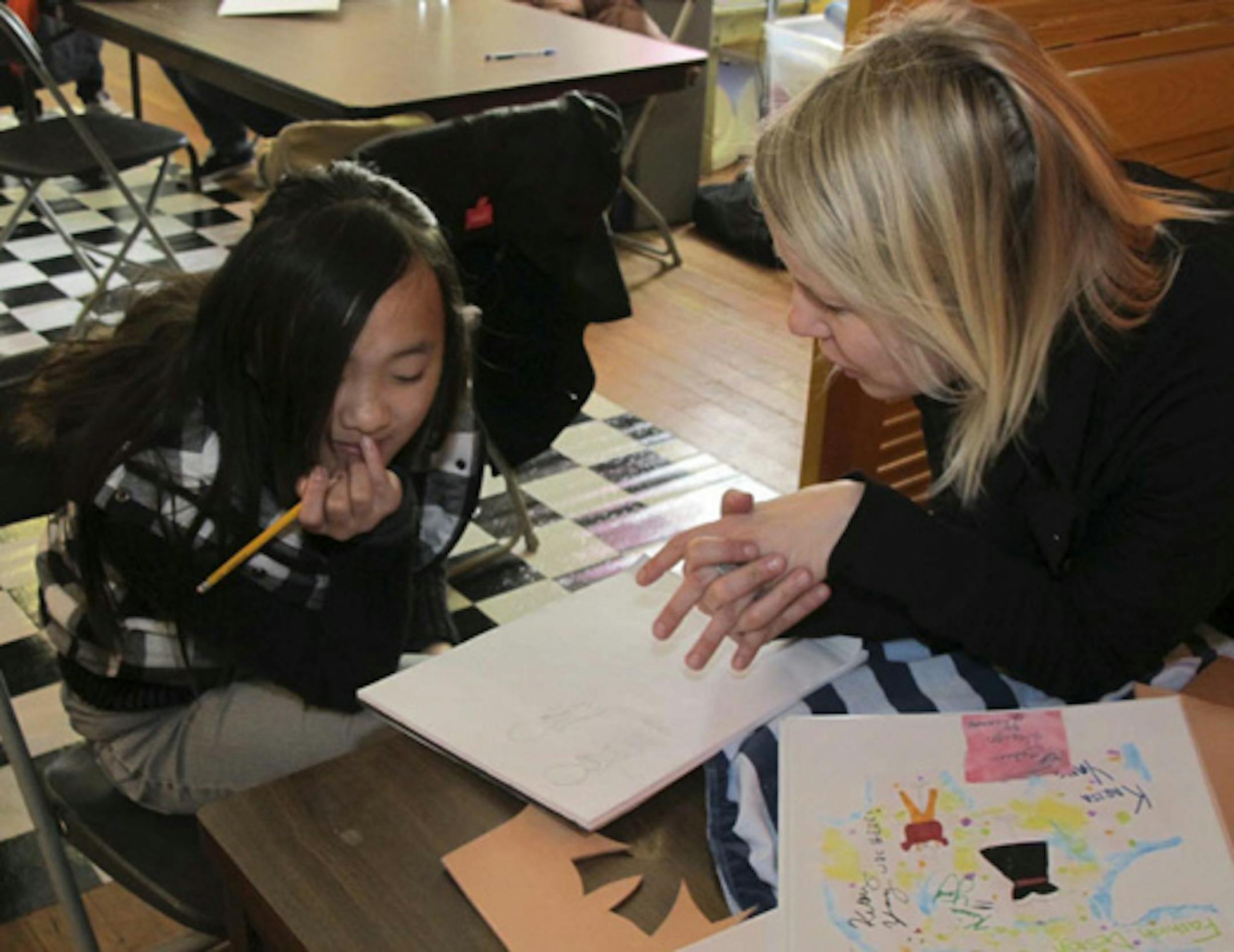 Karisa Yang, age 11, received advice from designer Kerry Riley.
