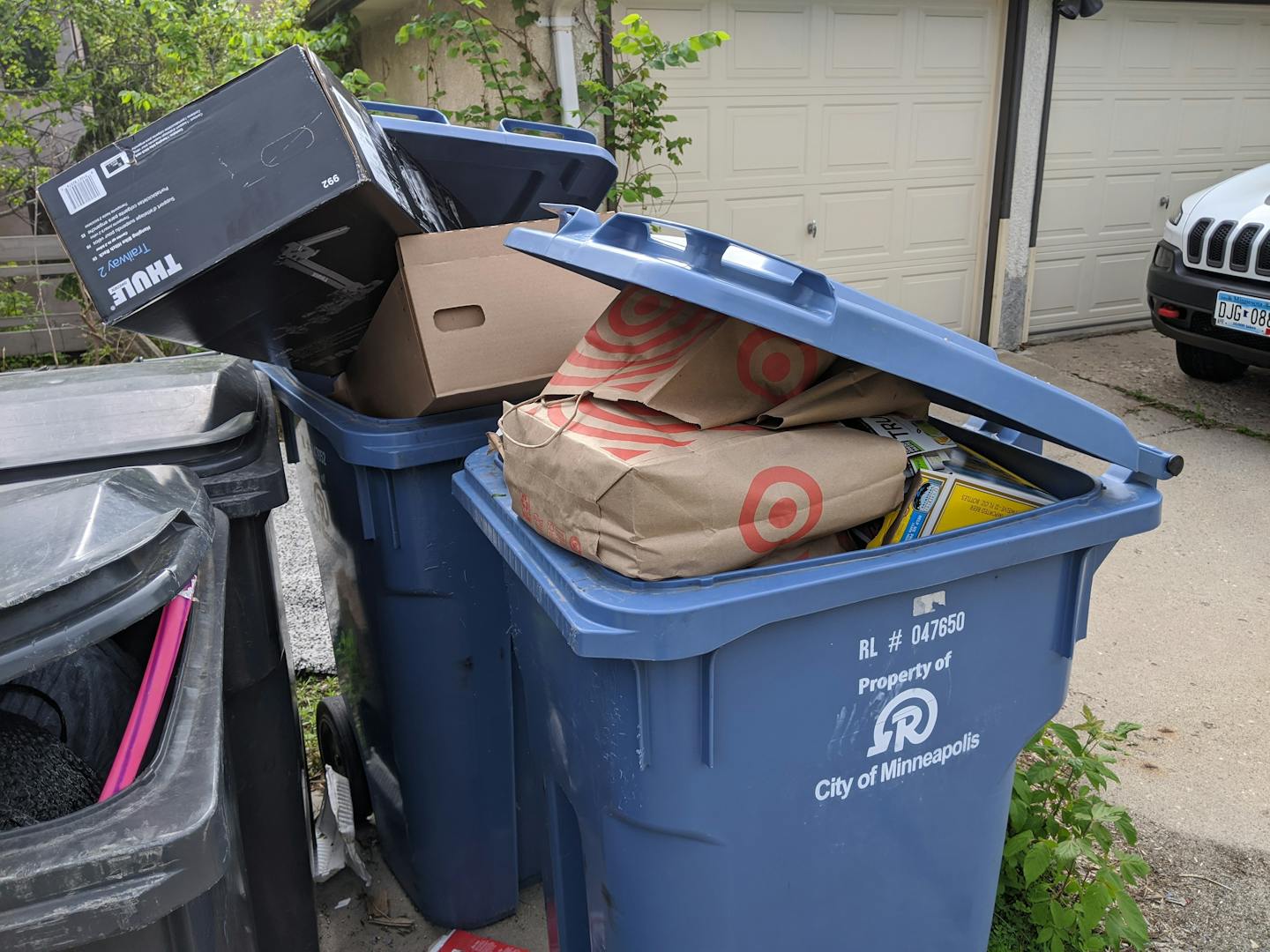 Why are the recycling bins overflowing in my alley