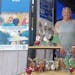 Sara Peterson displayed merchandise at the booth for Feed My Starving Children, one of the new vendors selected to participate in this year’s State 