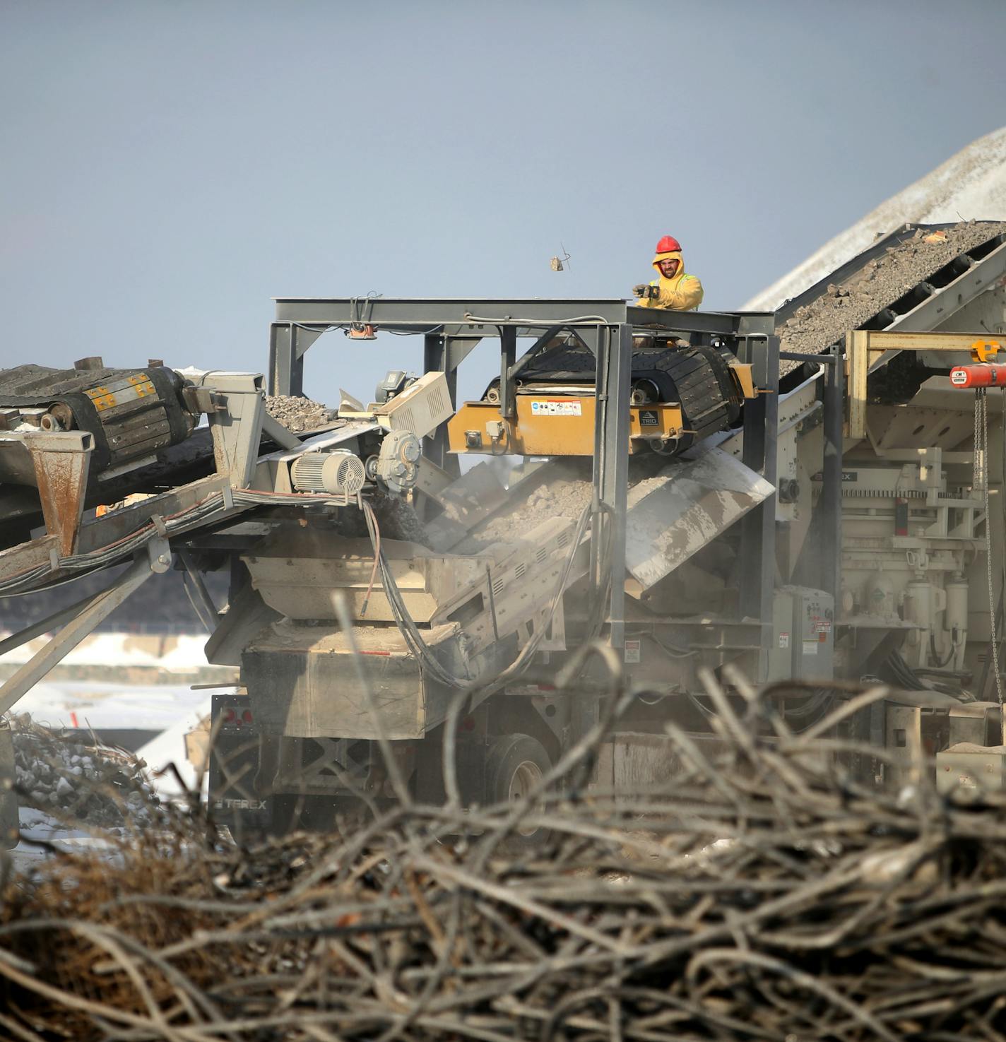 The massive Ford site in Highland Park, which occupies 144 acres including the Highland Little League Park, is now clear of buildings with pollution cleanup continuing and the remaining concrete foundations and slabs should be gone by mid-summer. The property is expected to go on the market by the end of 2015. Here, work goes continues on the site's concrete crushing operation Wednesday, Jan. 14, 2015, in St. Paul, MN.](DAVID JOLES/STARTRIBUNE)djoles@startribune.com The new year will see an impo