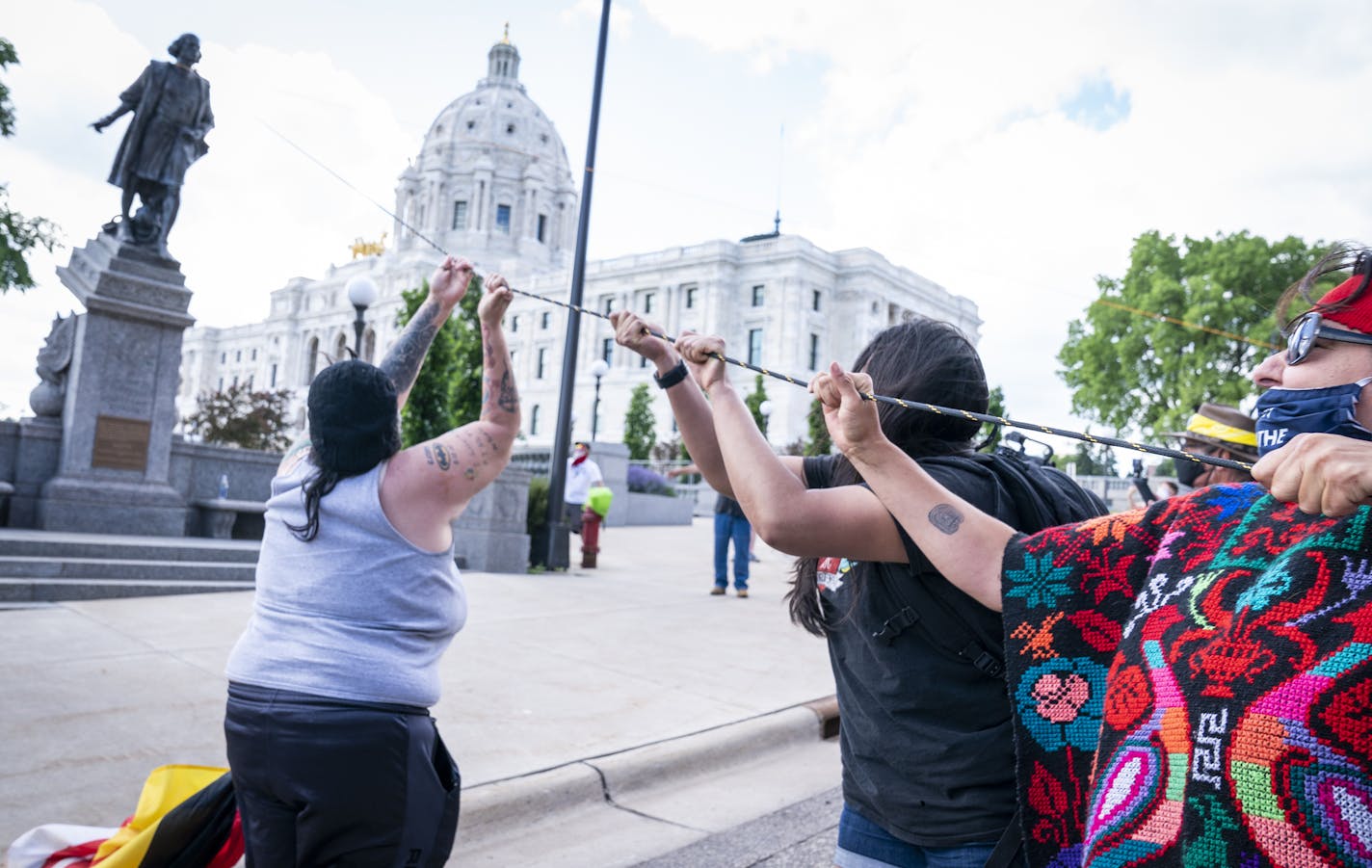 Activists pulled down the statue of Christopher Columbus in front of the Minnesota State Capitol. ] LEILA NAVIDI • leila.navidi@startribune.com BACKGROUND INFORMATION: Activists pulled down the statue of Christopher Columbus in front of the Minnesota State Capitol in St. Paul on Wednesday, June 10, 2020.