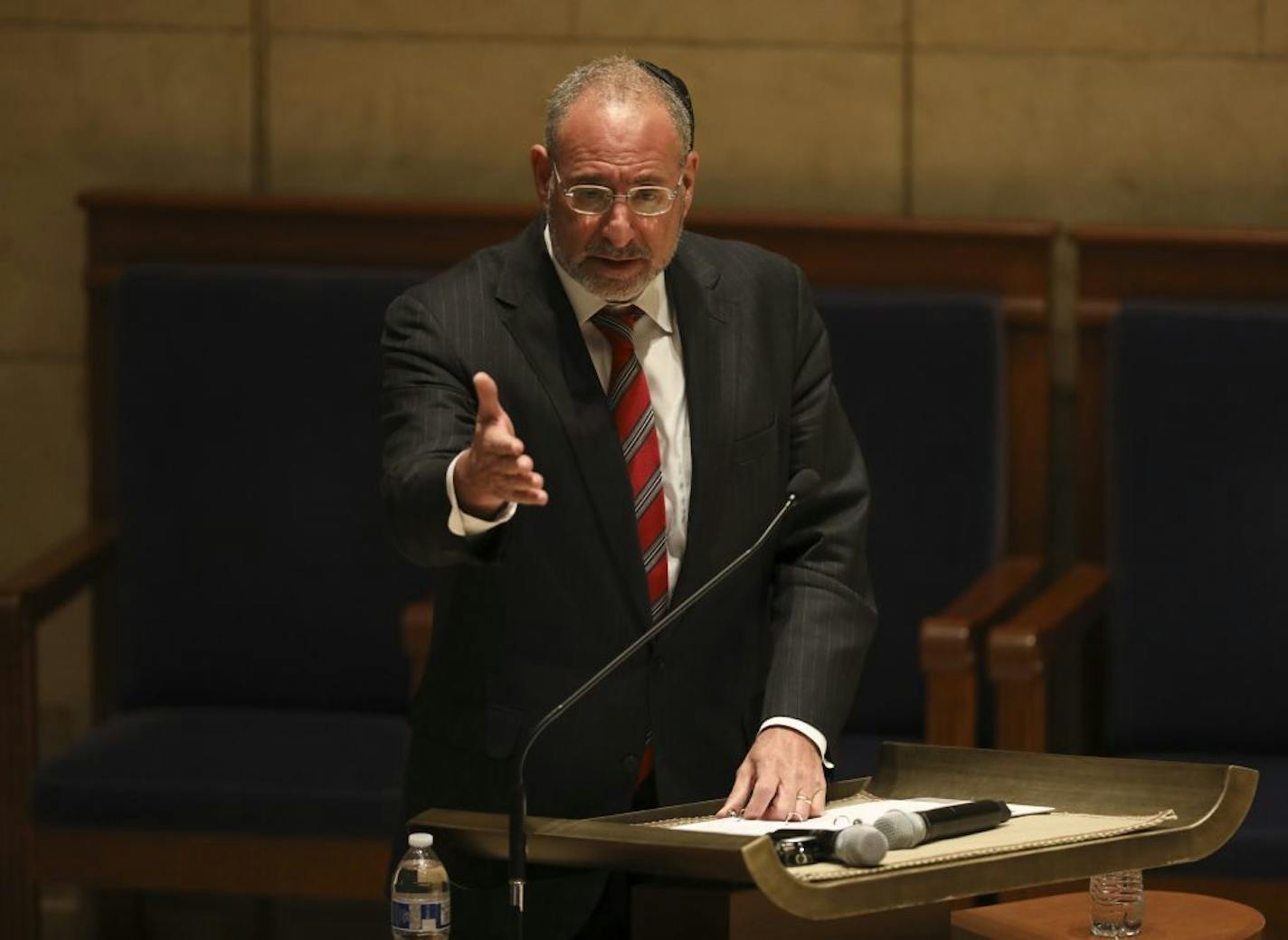 Former U.S. Attorney Andy Luger introduced Christian Picciolini to the audience gathered at Temple Israel Thursday night. It was Luger who first had the idea to bring him to Minneapolis to speak.