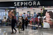 People leave a Sephora store in the Hudson Yards shopping mall in New York City.