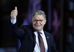 Sen. Al Franken, D-Minn. gestures as he leave the stage after speaking during the first day of the Democratic National Convention in Philadelphia , Mo