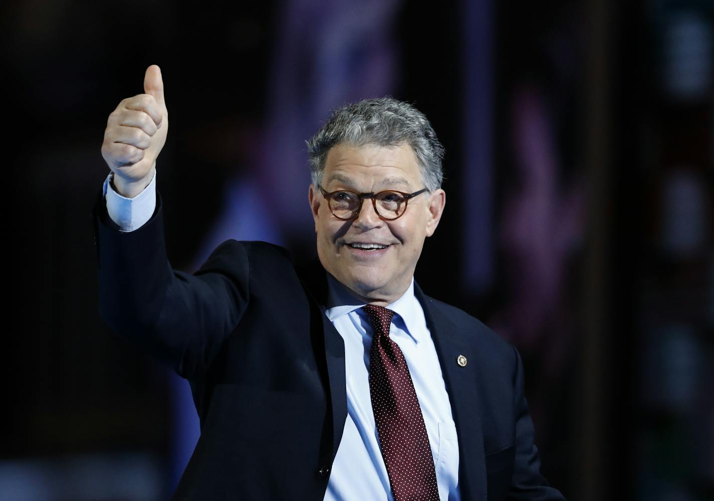 Sen. Al Franken, D-Minn. gestures as he leave the stage after speaking during the first day of the Democratic National Convention in Philadelphia , Monday, July 25, 2016. (AP Photo/Paul Sancya)