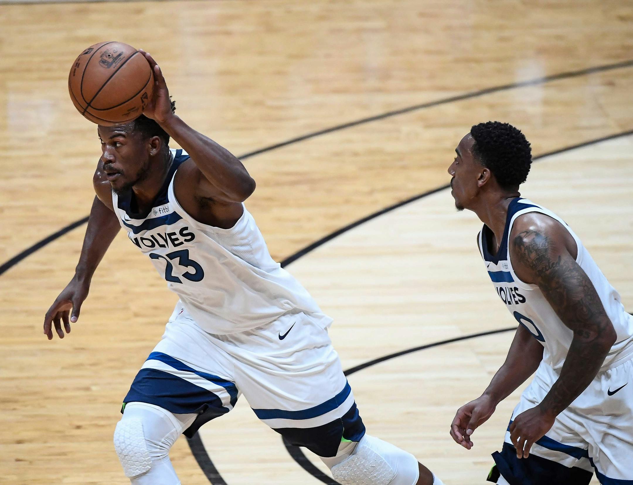 Minnesota Timberwolves guard Jimmy Butler (23) moved the ball down the court in front of fellow guard Jeff Teague (0) in the second quarter Saturday. ] AARON LAVINSKY ï aaron.lavinsky@startribune.com The Minnesota Timberwolves played the Los Angeles Lakers in their first game of the NBA preseason on Saturday, Sept. 30, 2017 at Honda Center in Anaheim, California.
